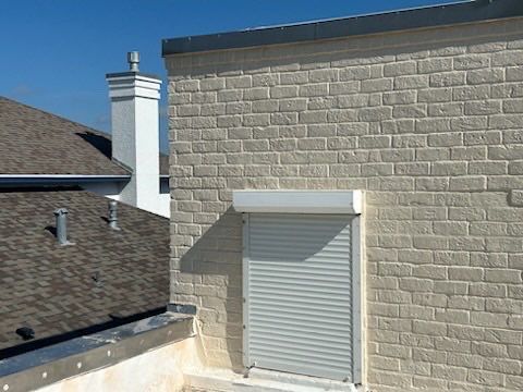 Off with the Tile and on with the TILCOR stone coated metal.  by Bayfront Roofing and Construction