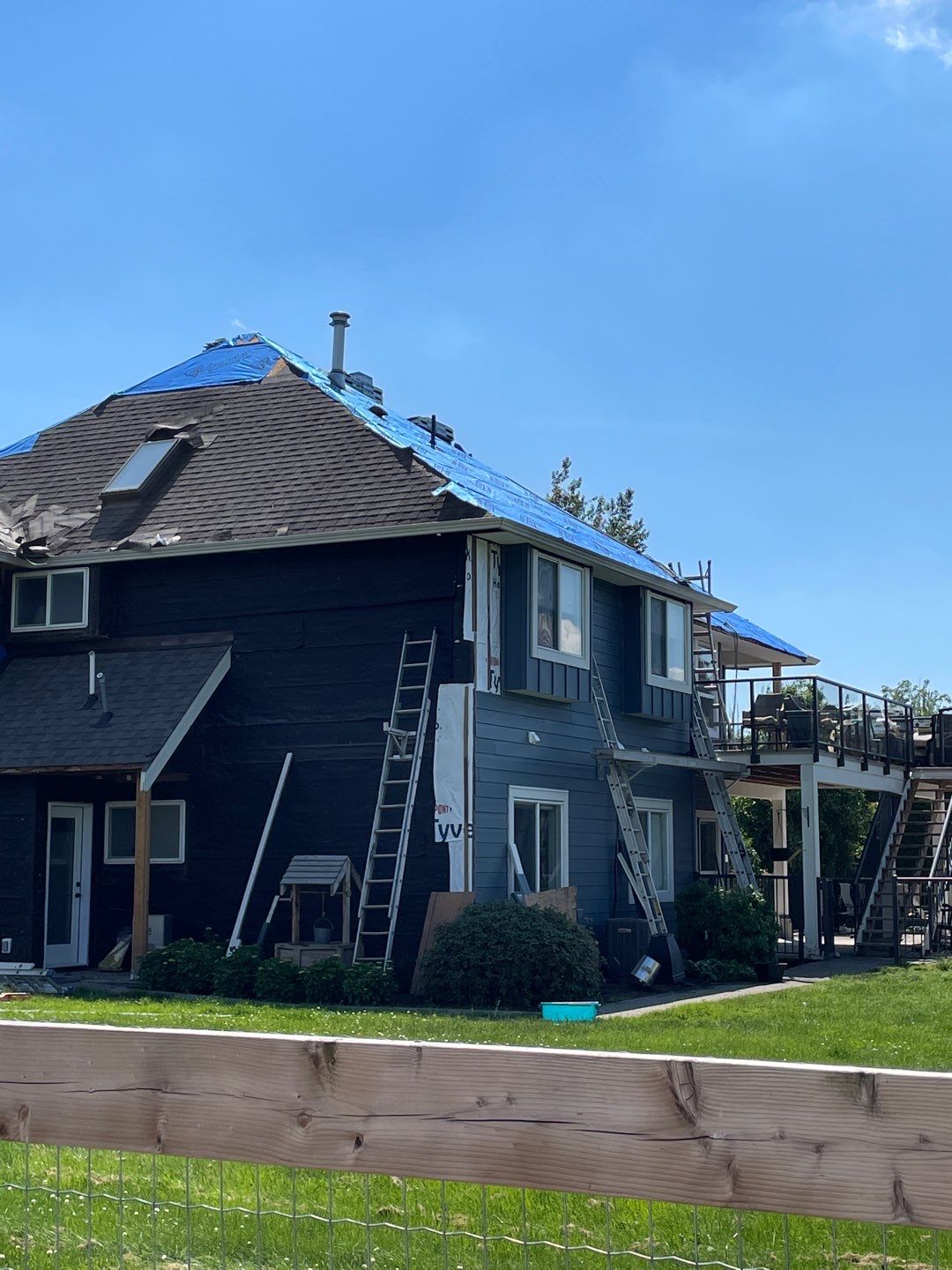 Residential Roofing Installation using IKO Weatherwood shingle by Top Notch Roofing Inc