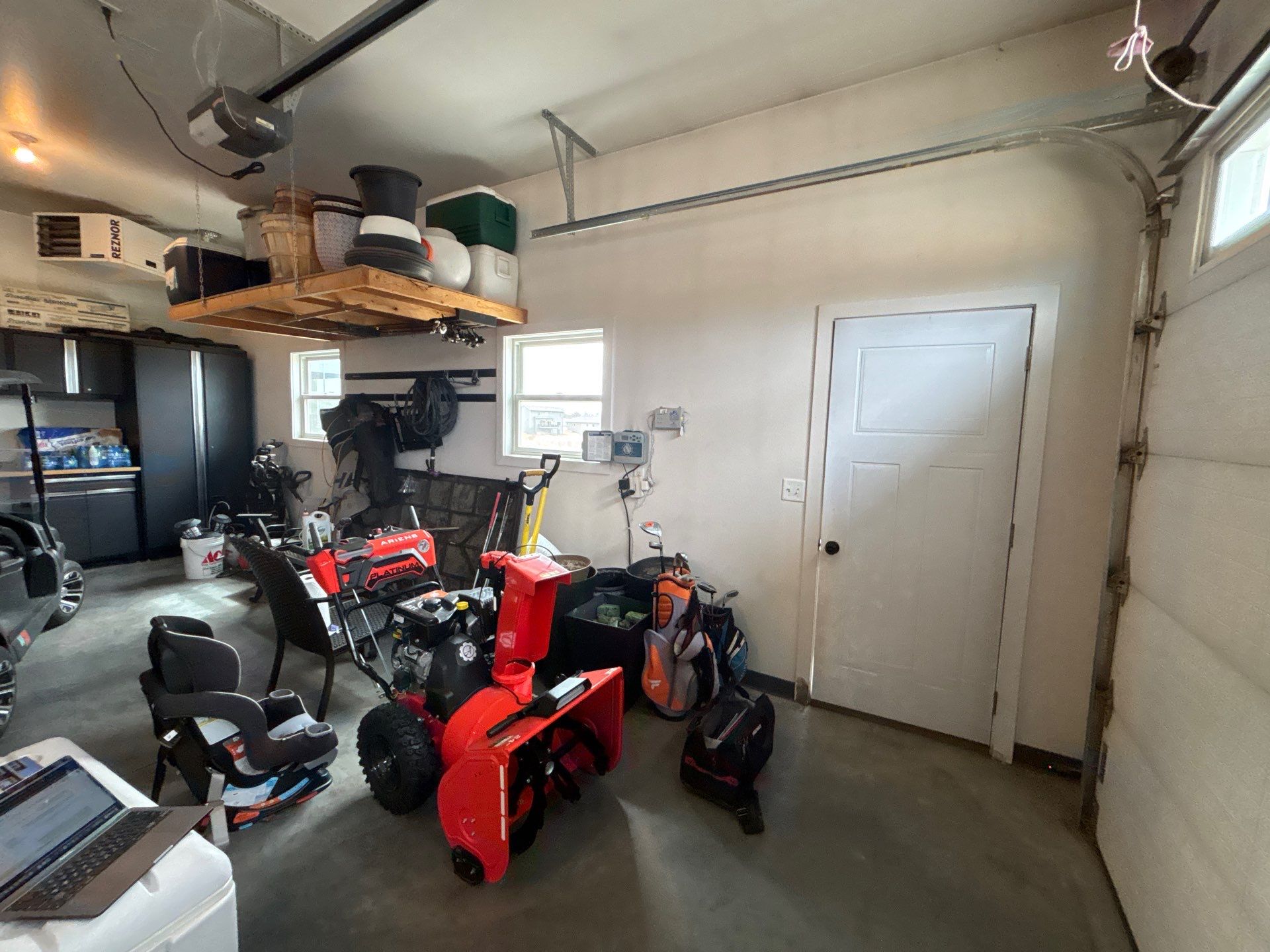 Multi-Car Garage Concrete Coating and Crack Repair in Dell Rapids by Select Painting, Coatings & Garage Cabinets