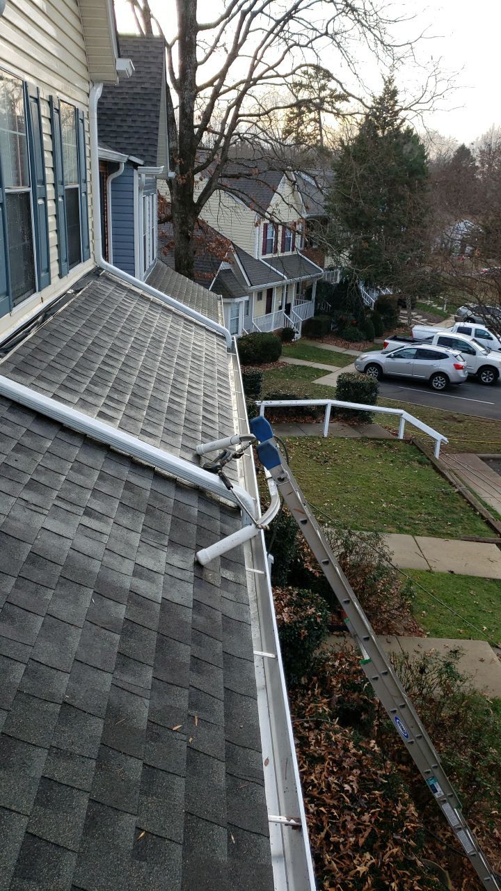 Gutter Cleaning using water by G&H Home Tech Pros LLC