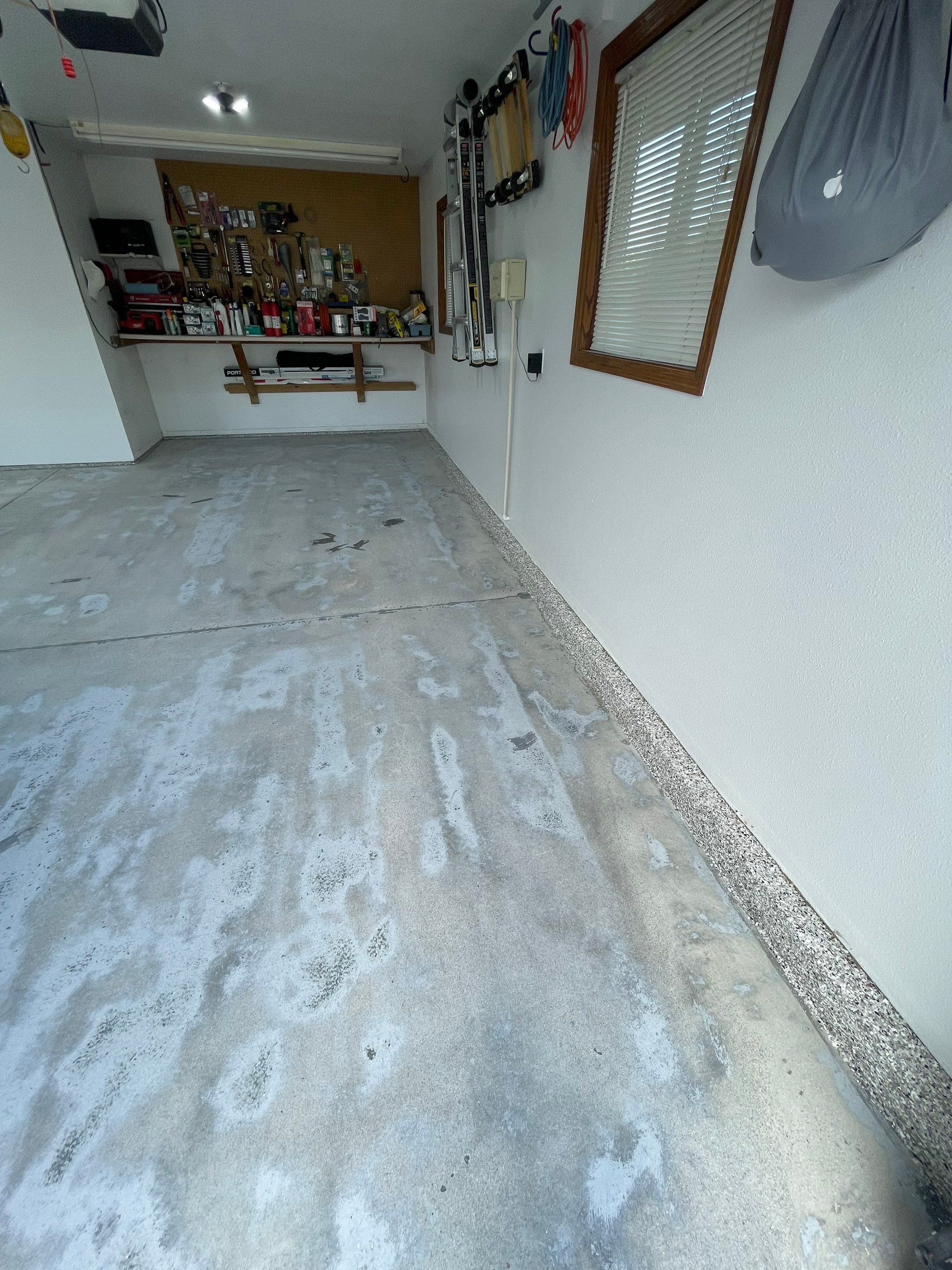 Multi-Car Garage Concrete Coating with Coyote Flake Finish in Sioux Falls by Select Painting, Coatings & Garage Cabinets