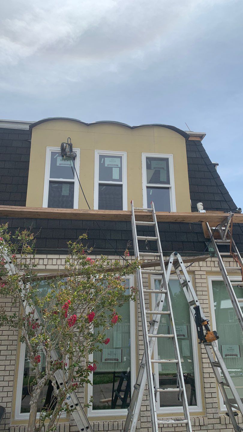 Mansard Charm by Bayfront Roofing and Construction