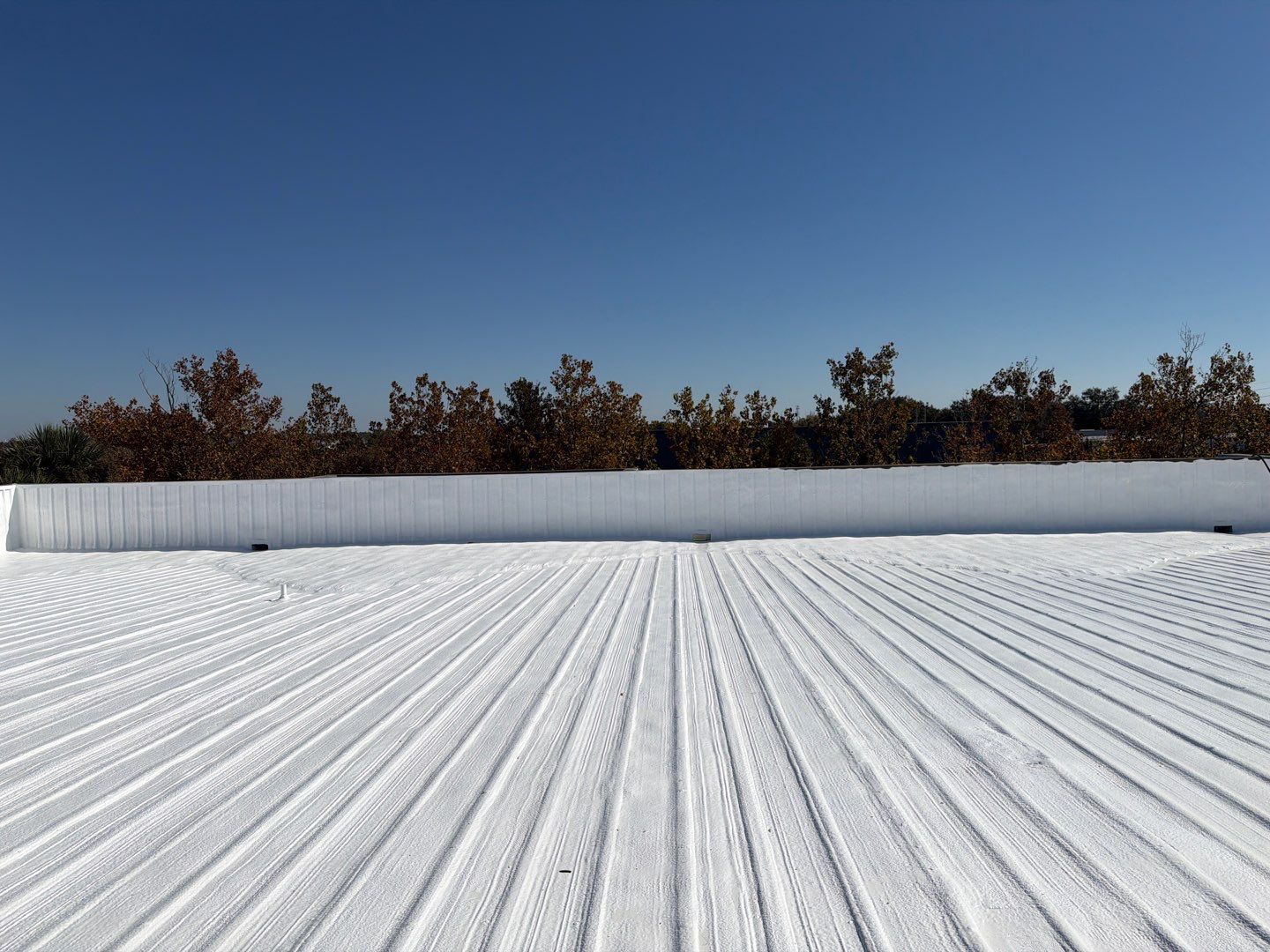 Orlando Commercial Metal Roof Restoration and Silicone Coating System by CES Roofing
