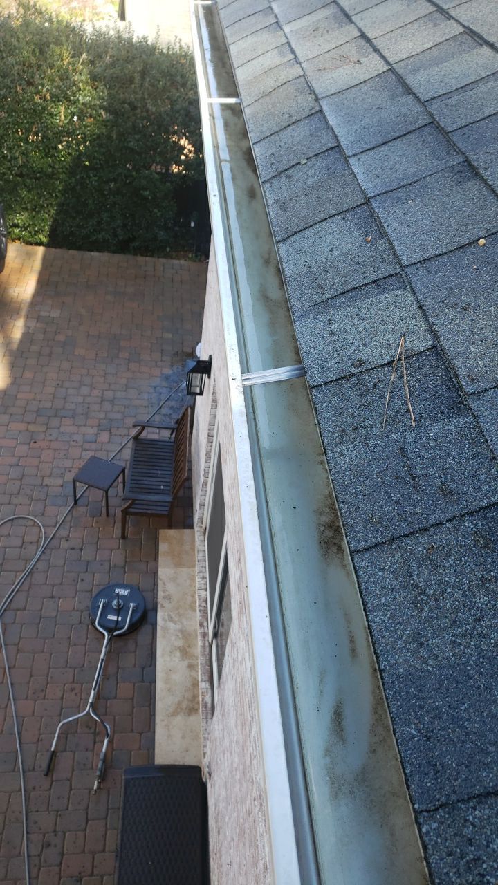 Gutter Cleaning using water by Power Wash Masters LLC