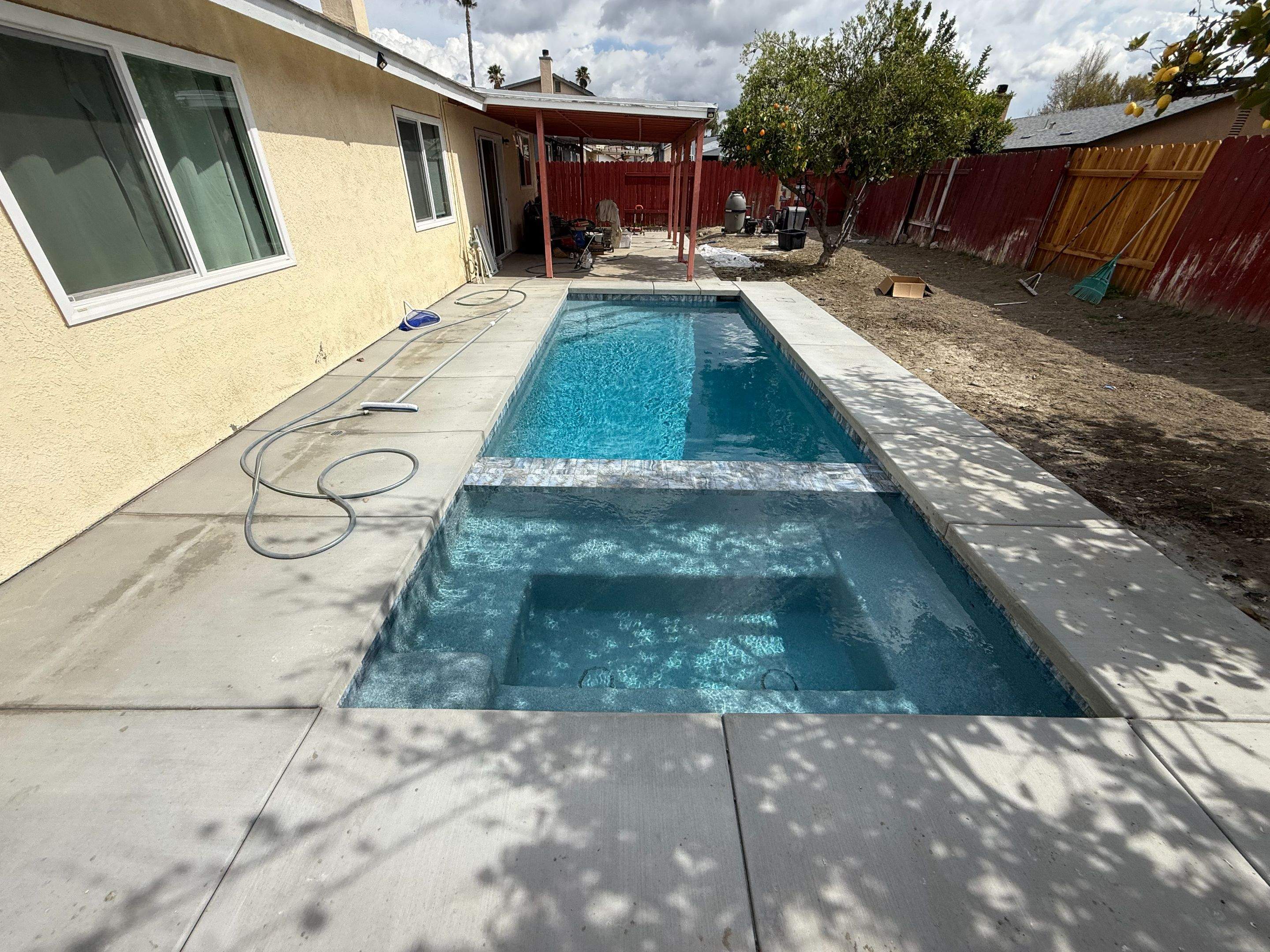 Small space pool and spa by Premier Pools and Spas Temecula