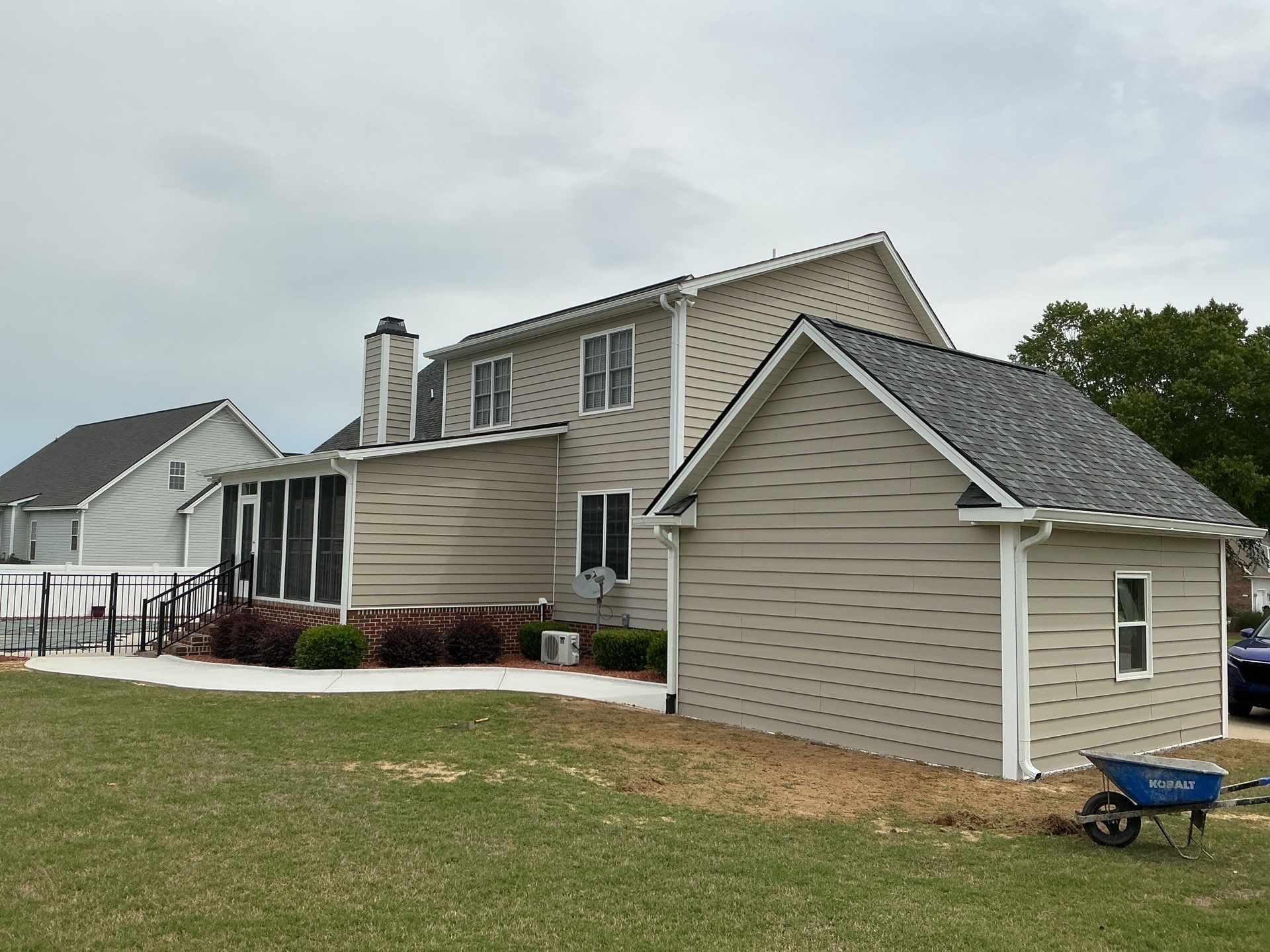Custom Screened Porch and Concrete Walkway Installation in Rocky Mount by The Remodeling Company
