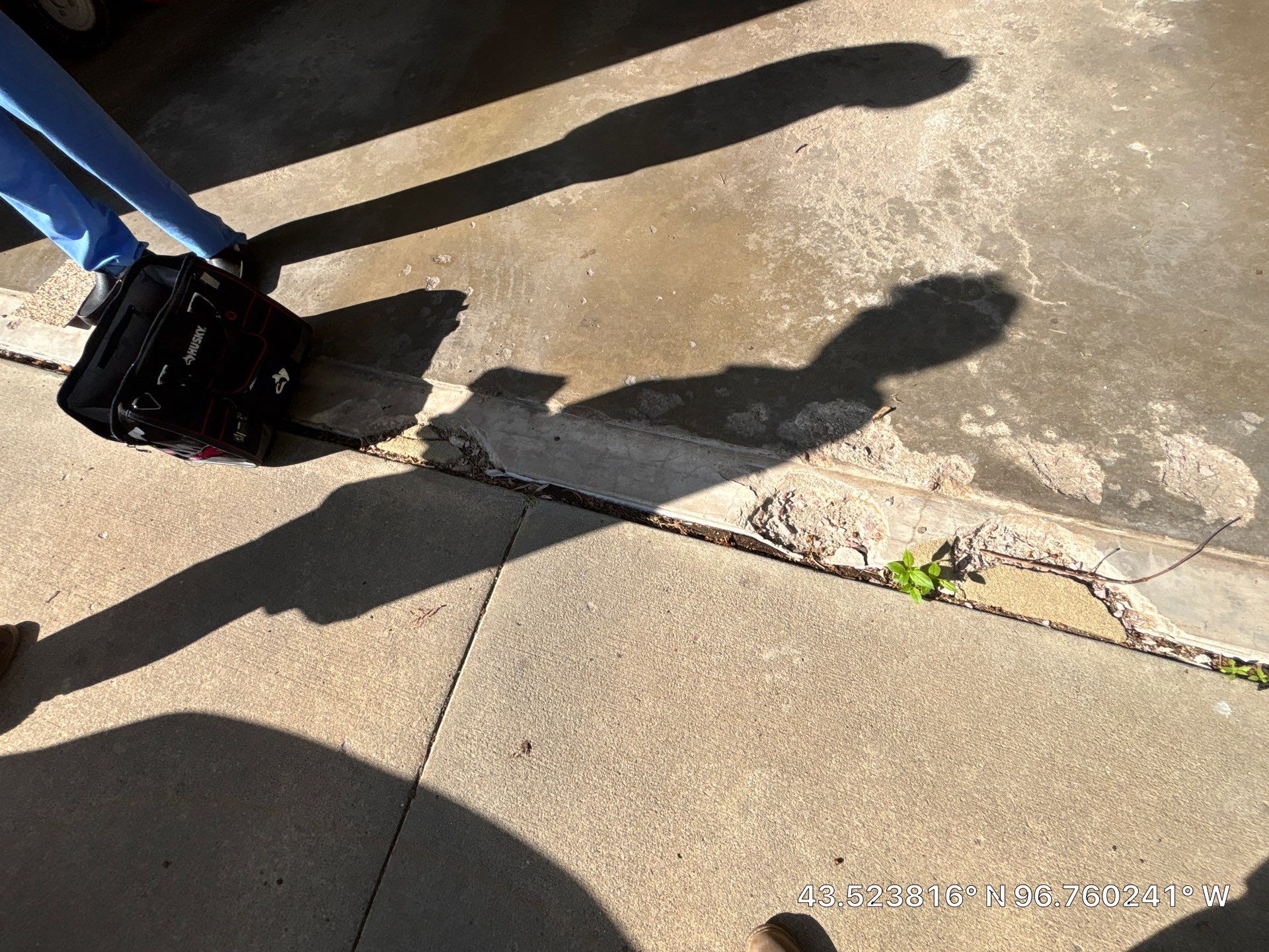 Custom Creekbed Garage Floor Coating in Sioux Falls by Select Painting, Coatings & Garage Cabinets