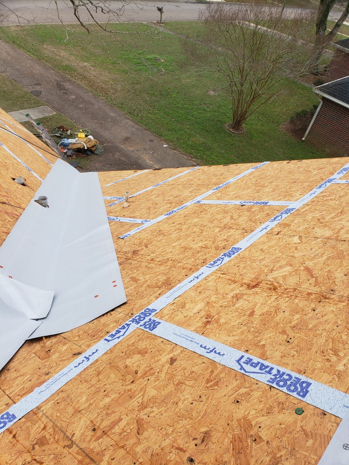 Residential Roofing Installation using Roof Replacement by American Roofing & Construction LLC