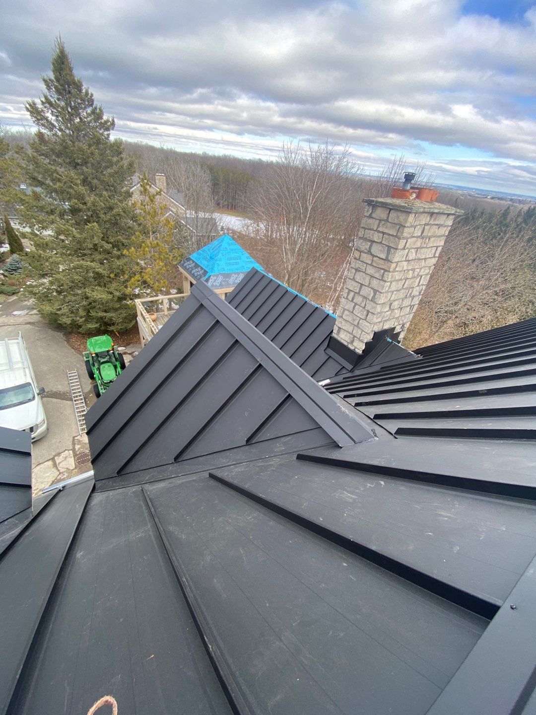Residential Roofing Installation using 24 Ga Standing Seam Metal by Jay Carter Roofing & Sheet Metal