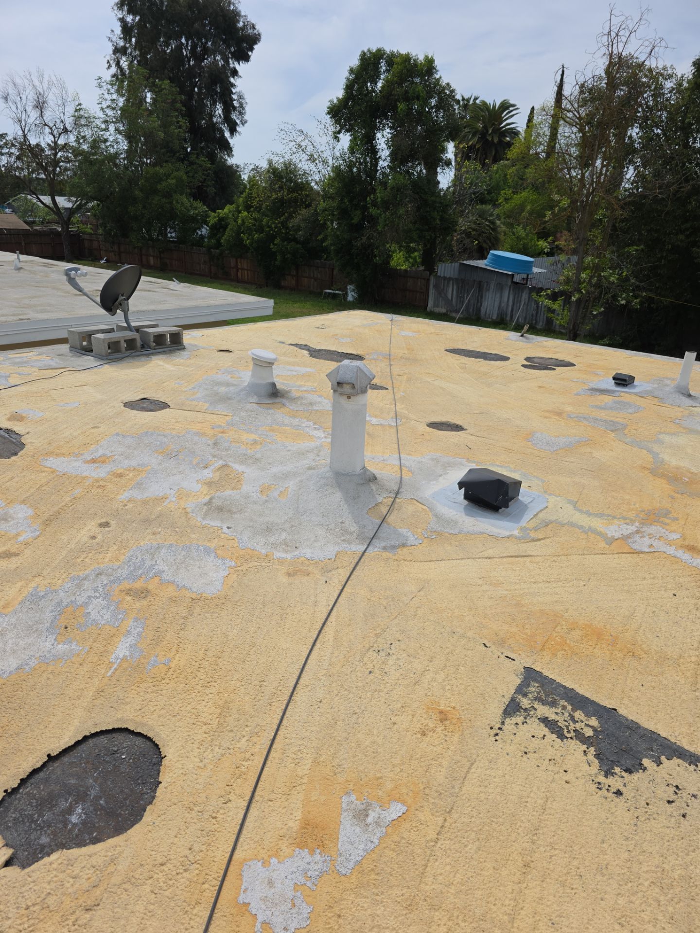 Foam Refurbish using Conklin Benchmark/PUMA XL coatings and spray foam by Straight Edge Roofing Inc