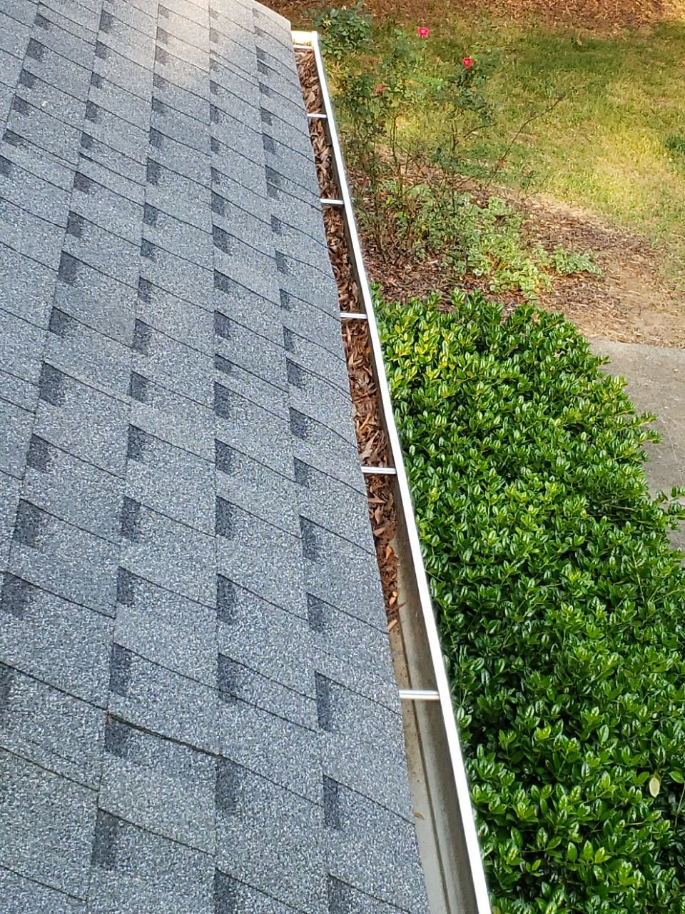 Gutter Cleaning using water by Power Wash Masters LLC