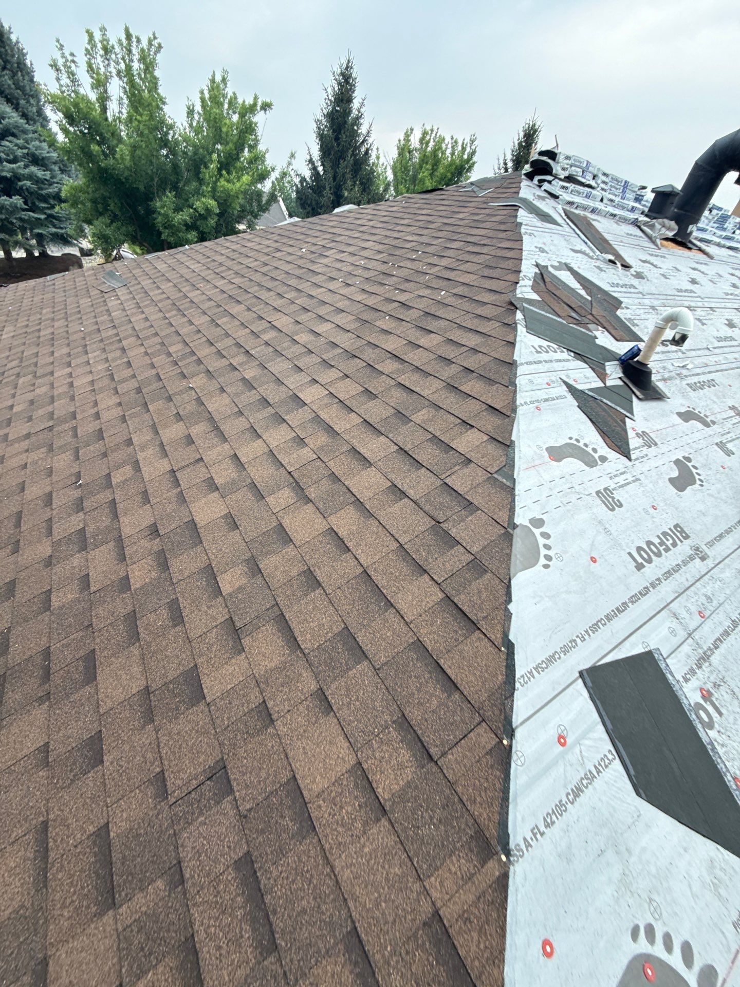 Boise Commercial Roof Replacement with Brown Architectural Shingles by Olive Roofing