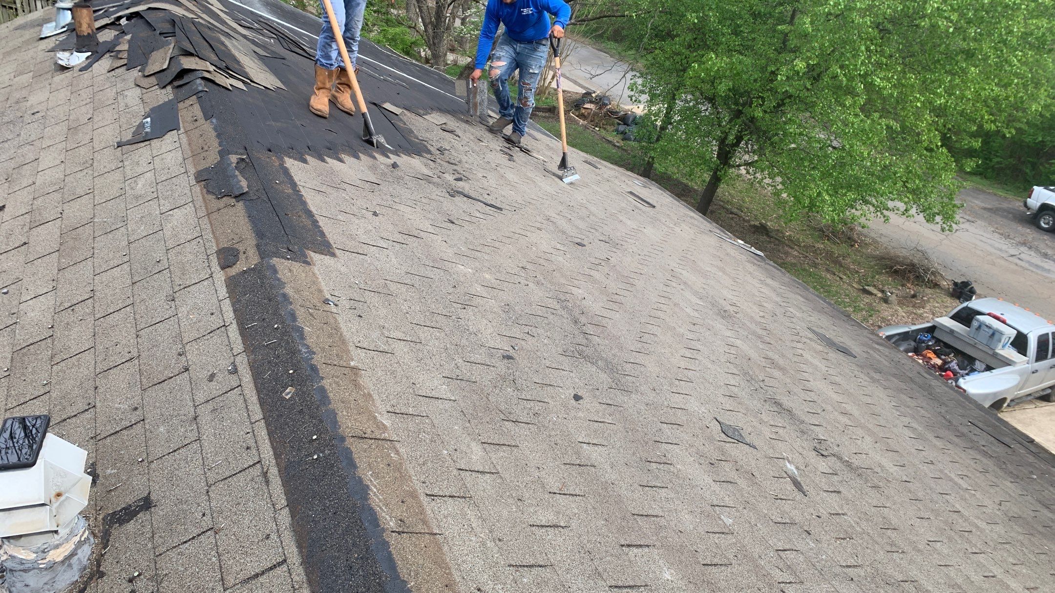 Residential Roofing Installation using 26 Gauge Colored Panels by Hostetler Roofing