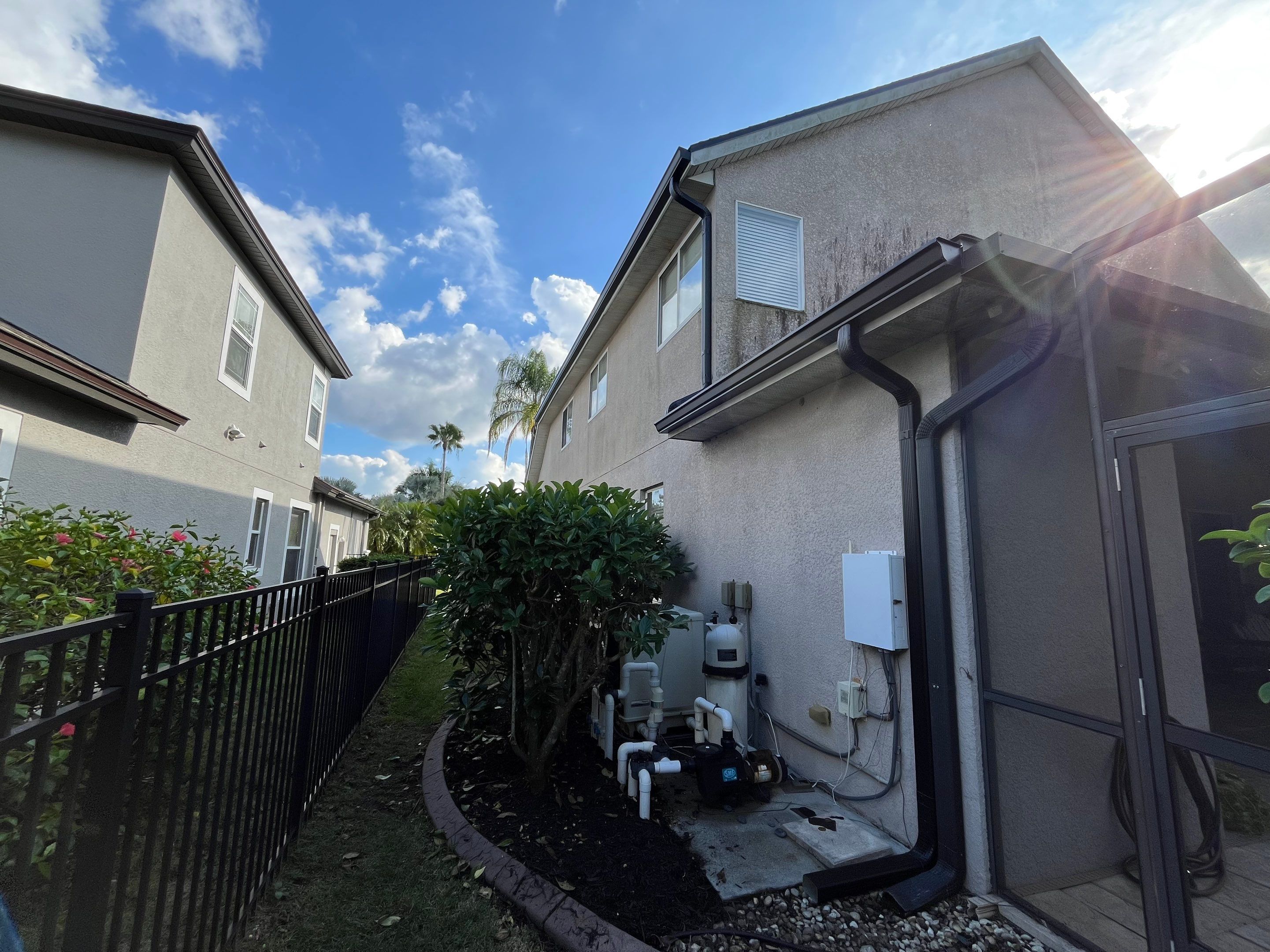 Black 6-inch Seamless Gutters for Modern Ellenton Homes FL by Gutter Professors