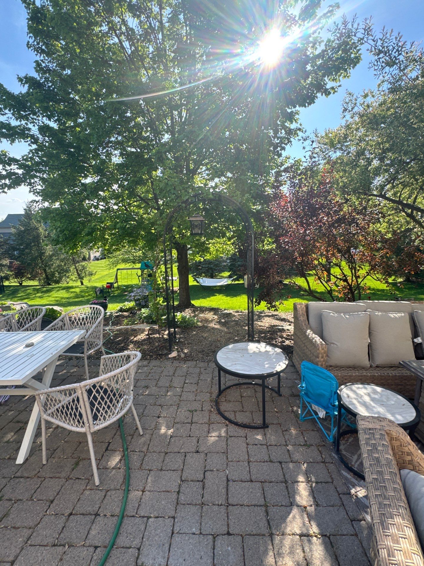 Backyard Retreat: Techo-Bloc Patio + Firepit Lounge by Saylor’s Lawn & Landscape