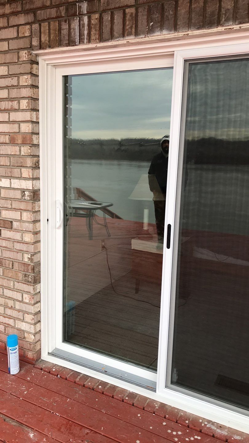 Deck Refurbush and Door Replacement using Trex Decking and Railing.  Polaris Patio Doors by Secure Construction Company Inc