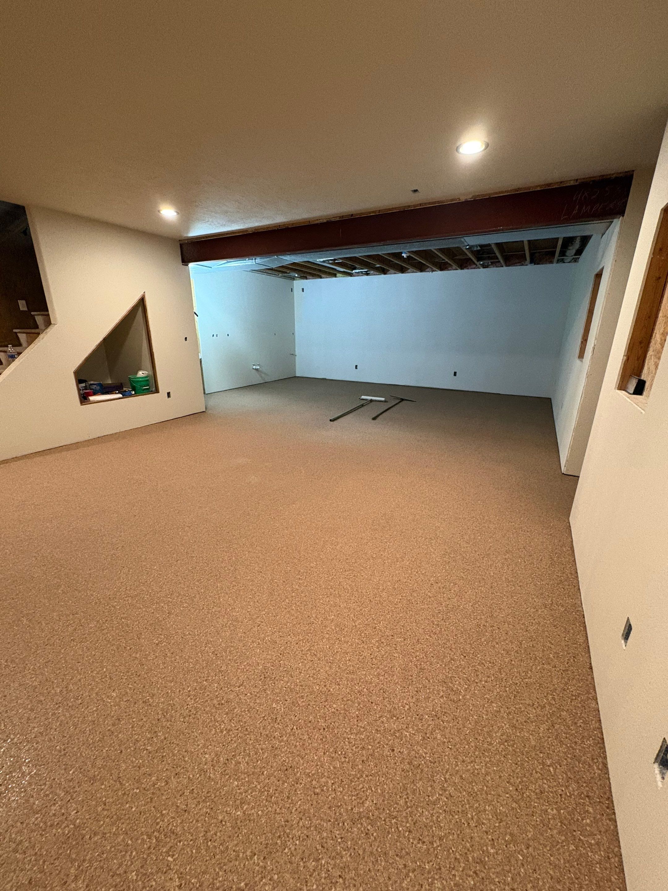 Custom Chip Concrete Coating for Colman Basement and Garage by Select Painting, Coatings & Garage Cabinets