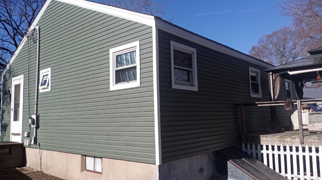 Siding Installation using Certainteed Mainstreet Forest Green by A Plus Exterior