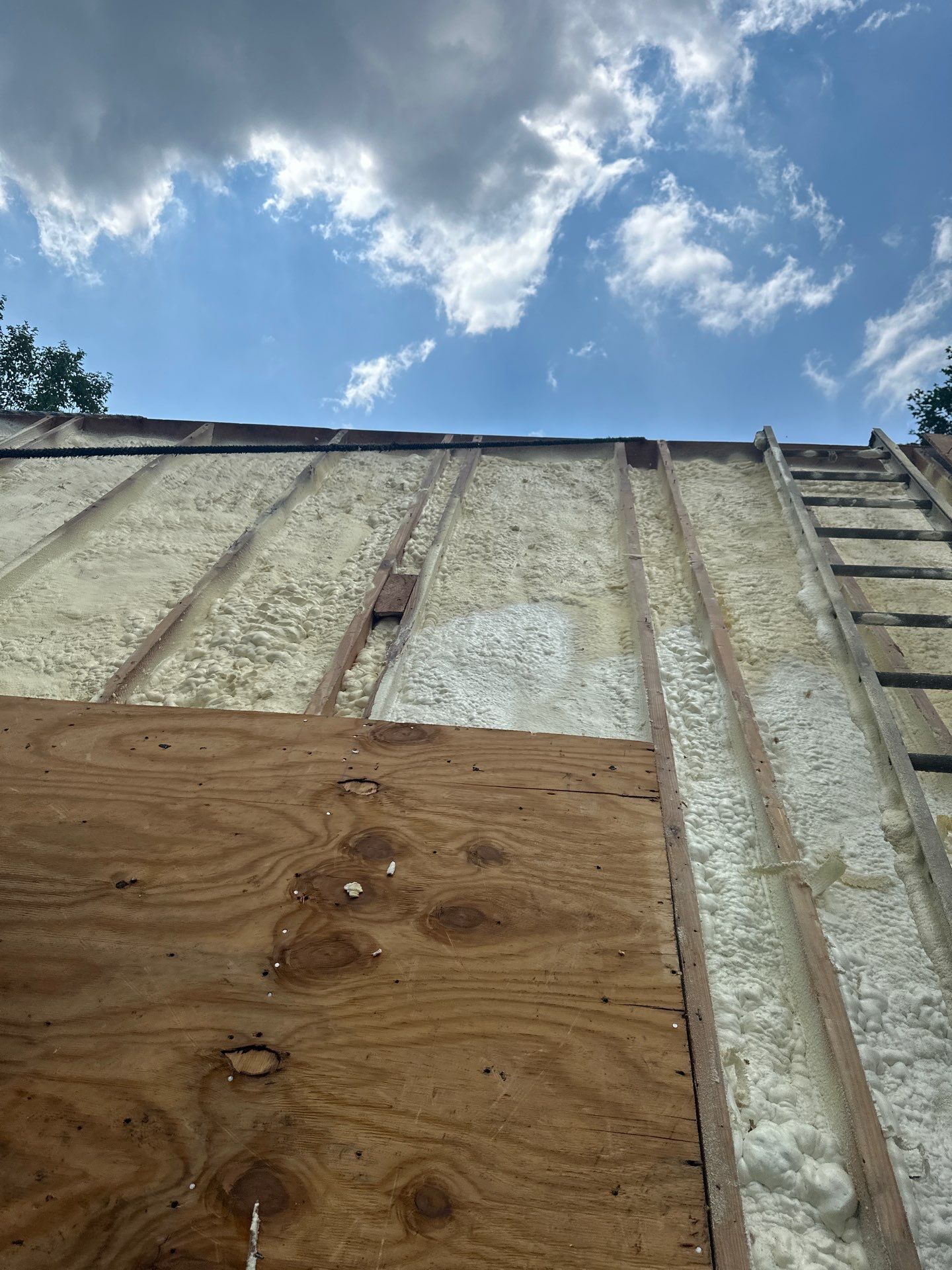 Exterior Installation using Closed Cell Spray Foam by NYS Foam & Energy