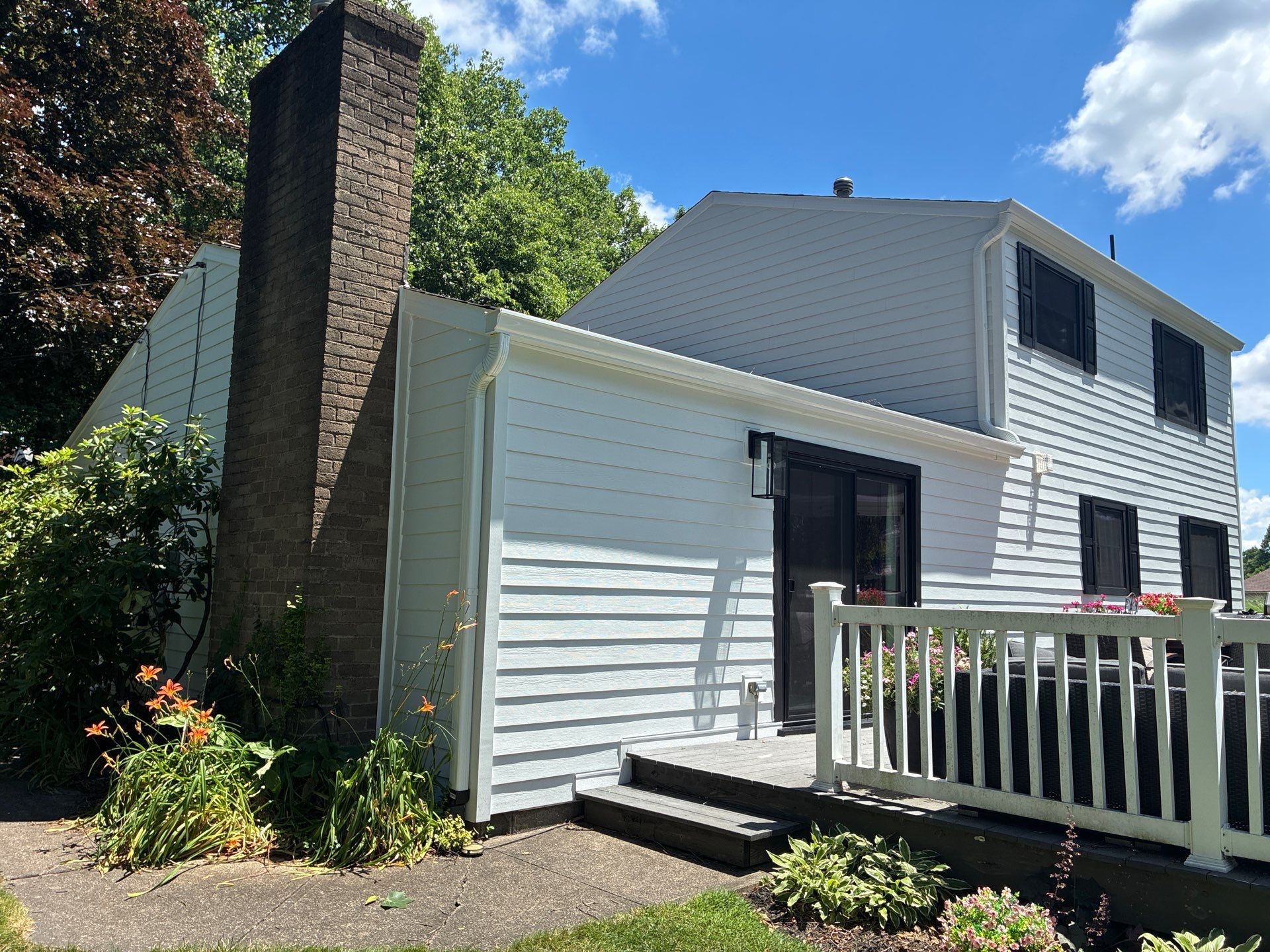 Vinyl Siding to James Hardie Arctic White with Midnight Black Trim by Ideal Siding Pittsburgh