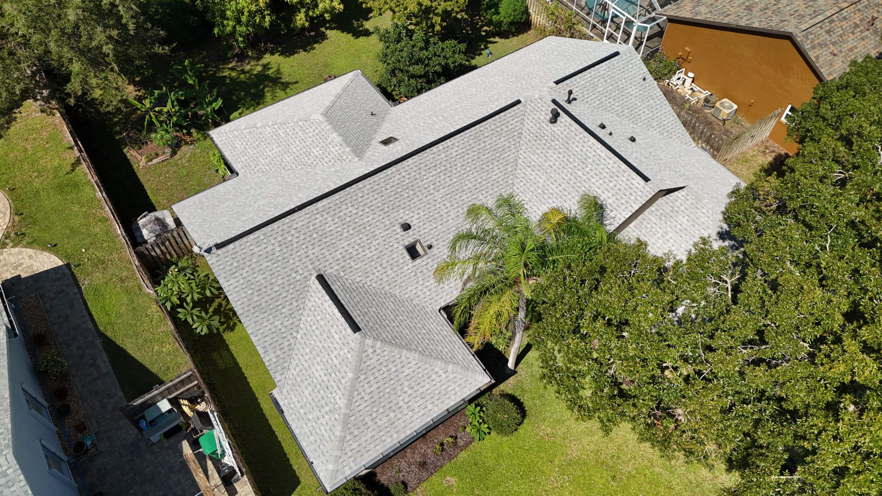 Comprehensive Roof Replacement w/ Old English Pewter Shingles & Black Ridge Vent in Melbourne