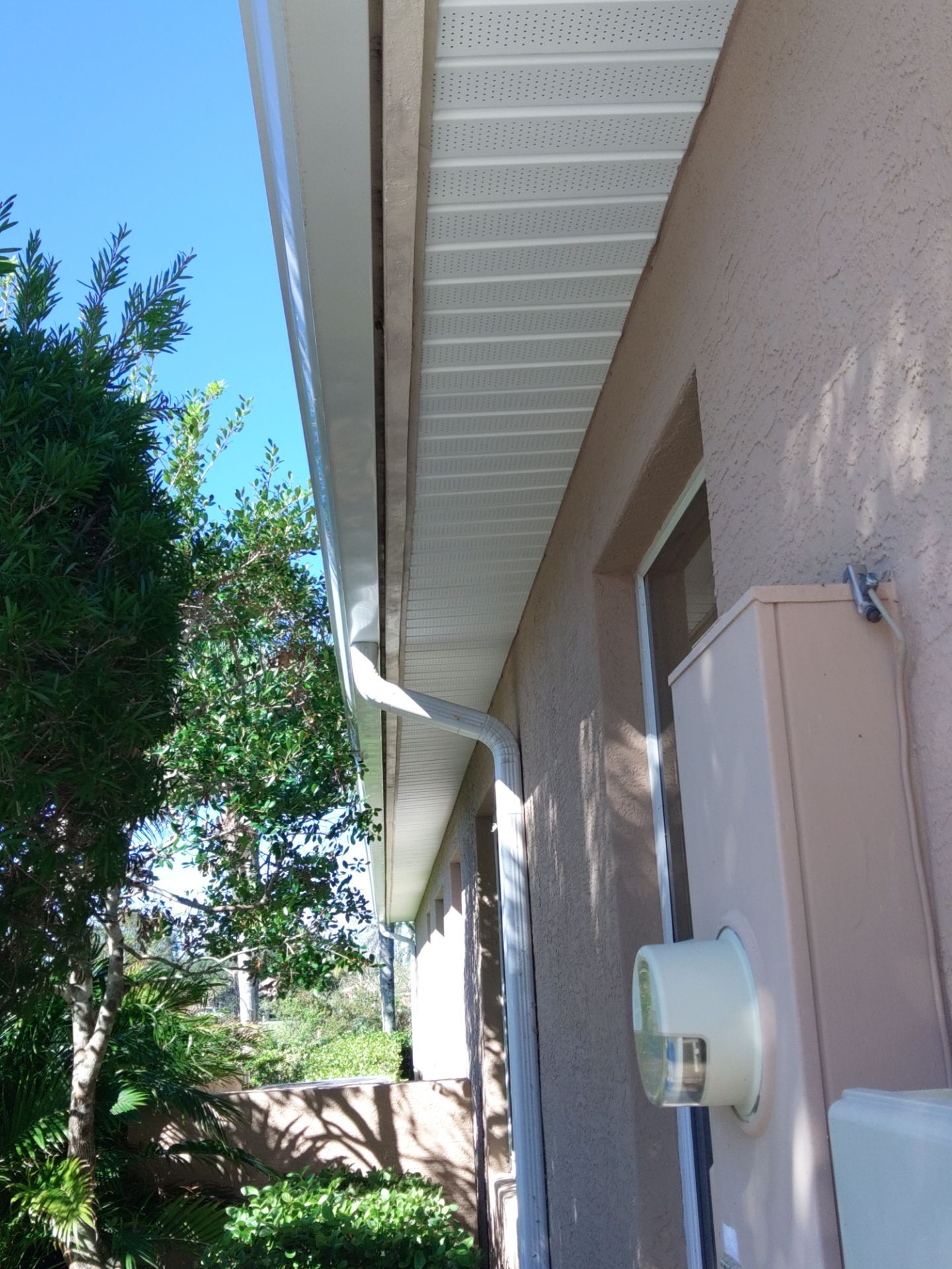White Soffit and Fascia Installation for Coastal Homes in Sarasota FL by Gutter Professors