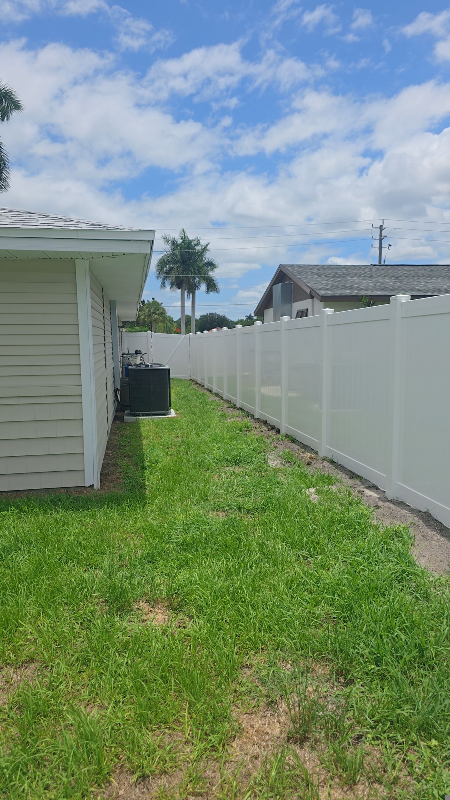 White Vinyl Privacy Fence Installation in Bonita Springs by True Fence LLC