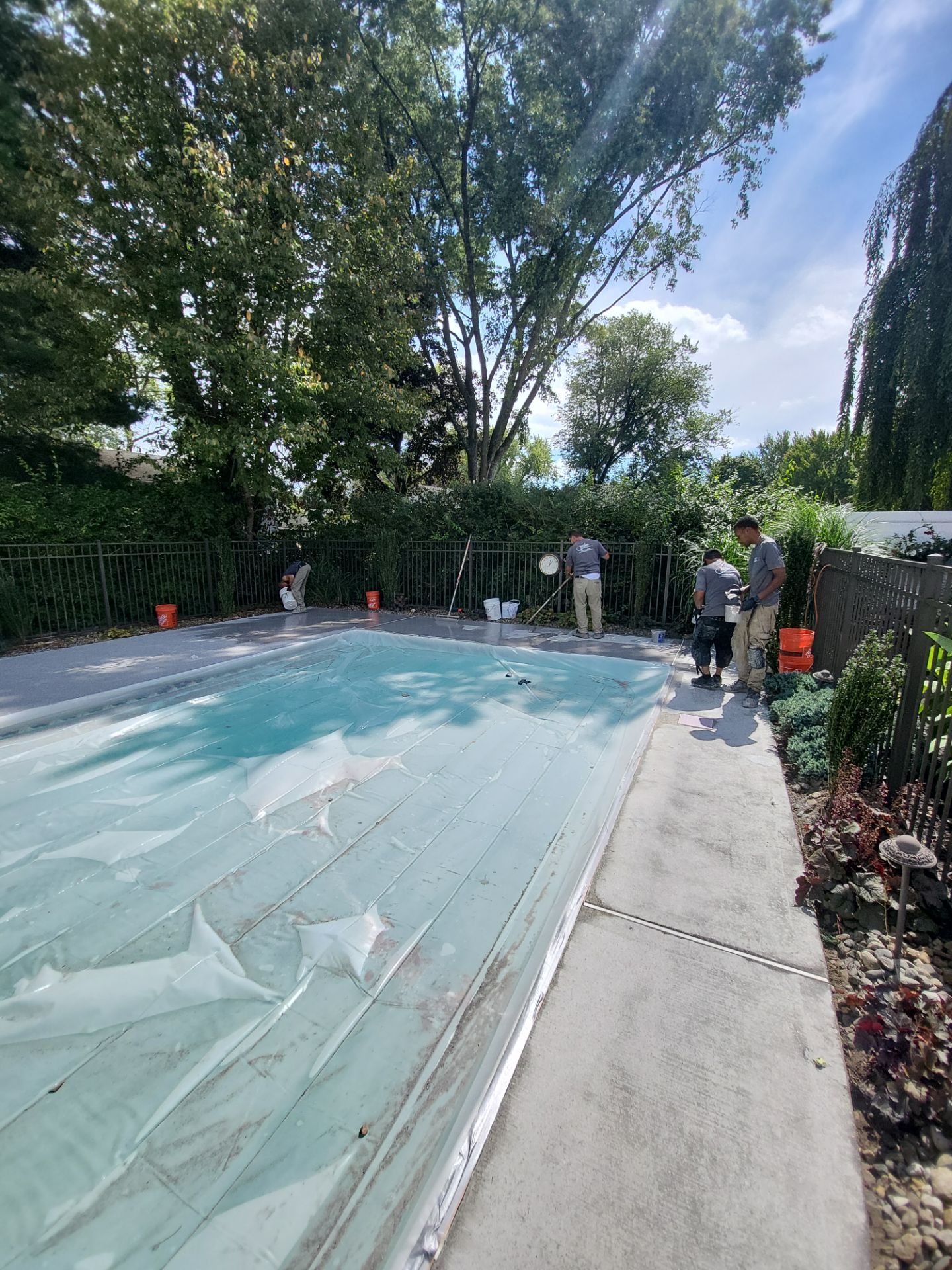 Blue Granite Pool Patio Concrete Coating in Lincoln Park by Spectrum Painting, LLC