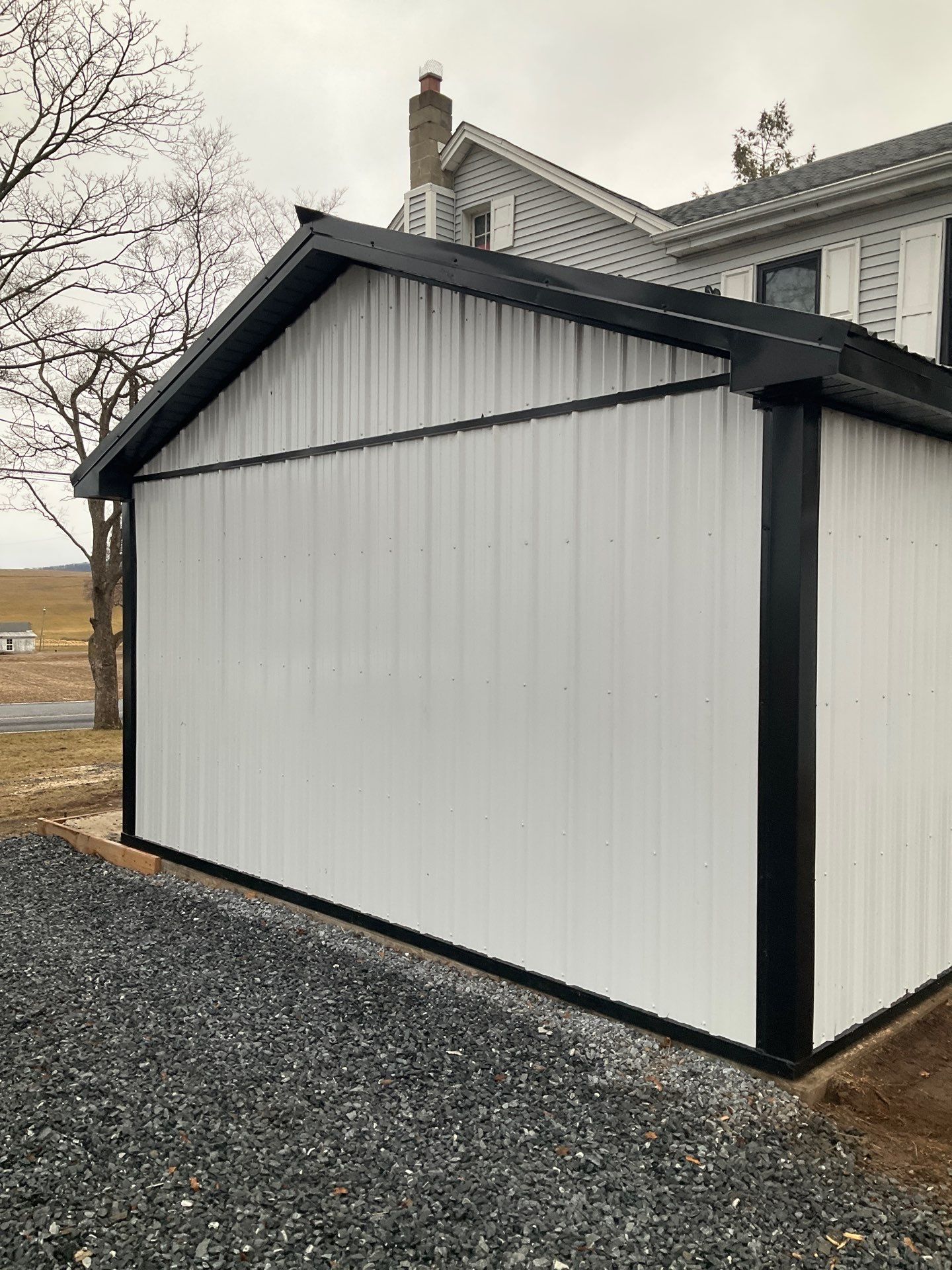 Carport Enclosure with Metal Siding and Roofing in Halifax by Esh Builders