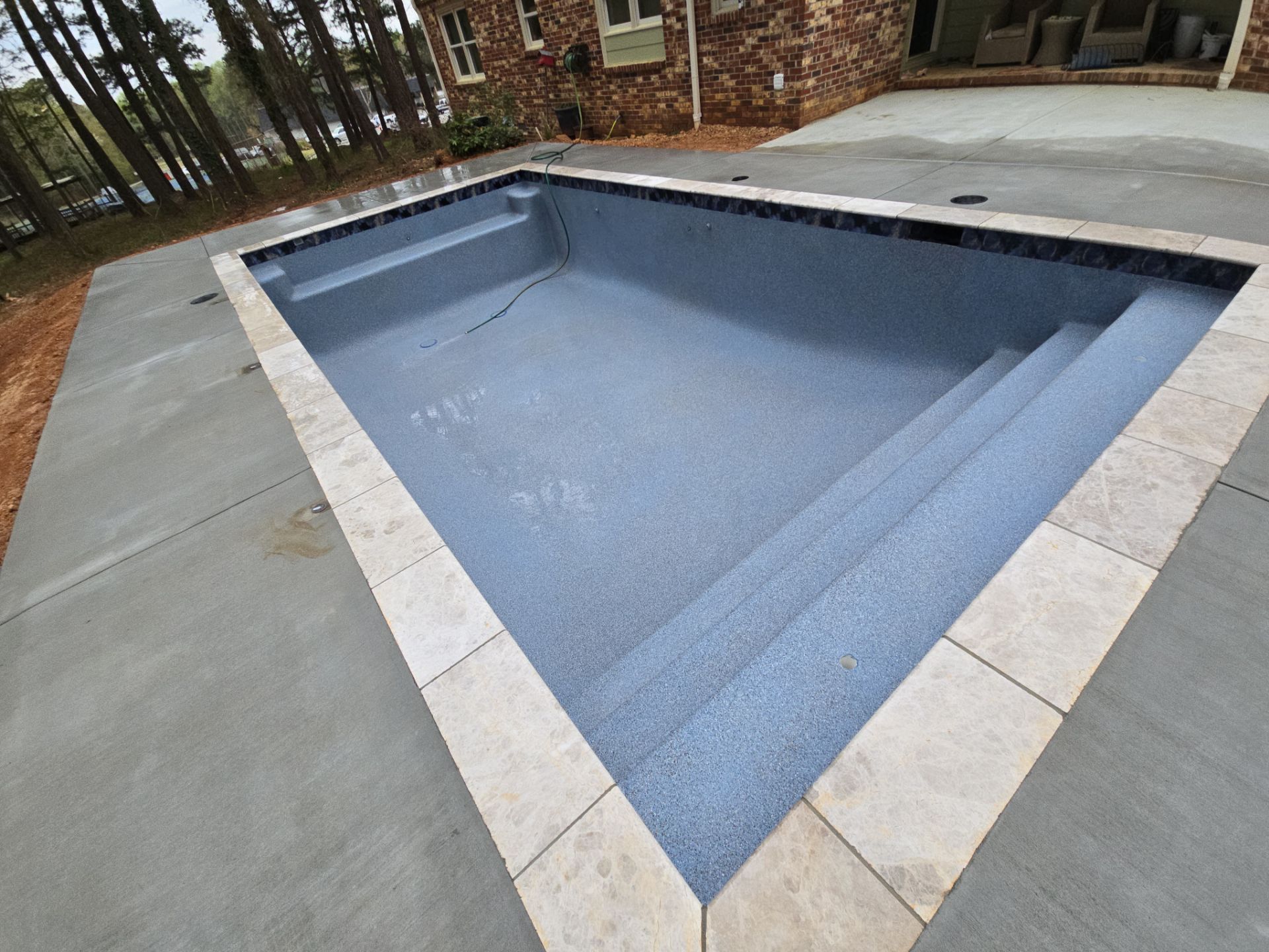 Universal - Wave by Olympic Pool Plastering