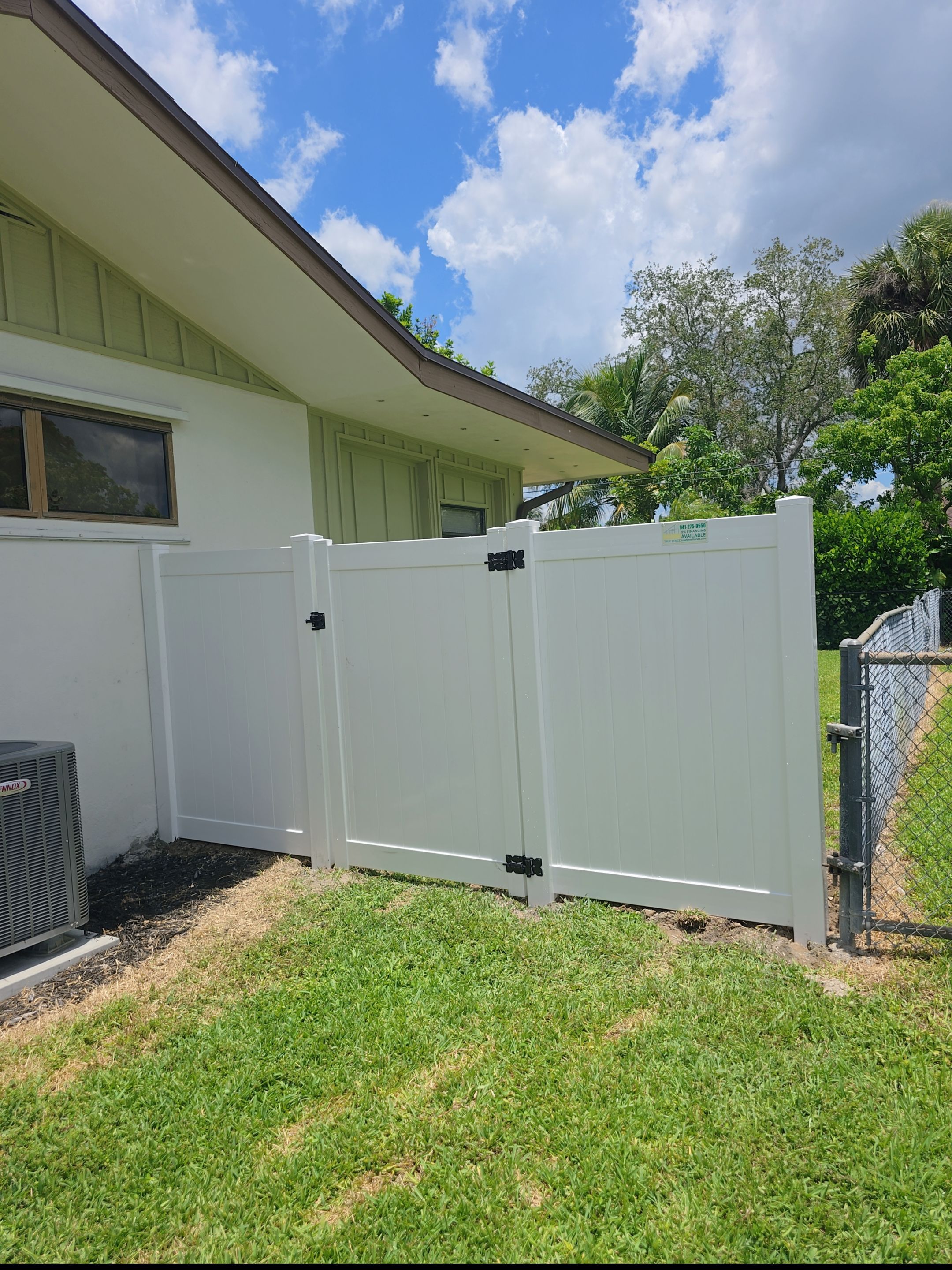 Residential Chain Link Fence Repair and Vinyl Privacy Gate Installation in Naples by True Fence LLC