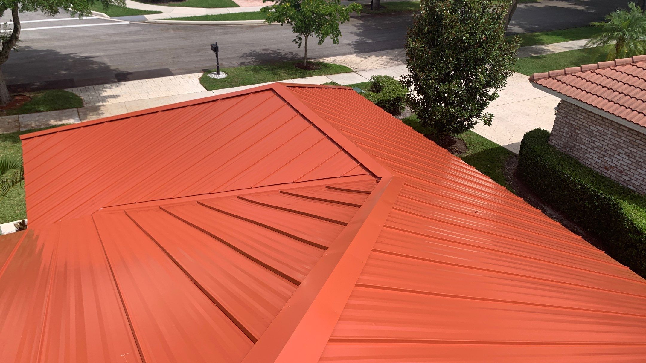 Residential Roofing Installation using 1" Nail strip metal roof by BLUES BROTHERS CONSTRUCTION CORP