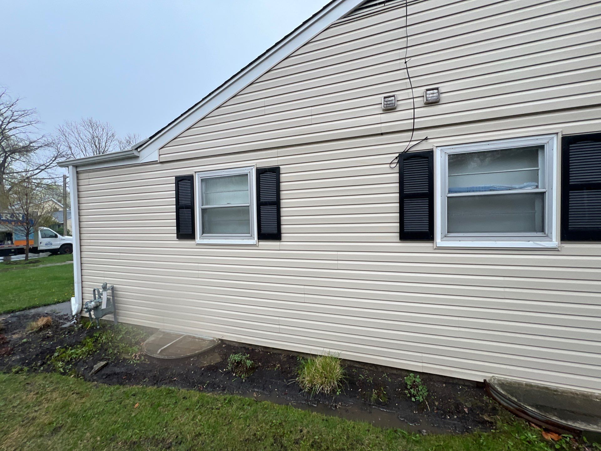 Housewashing  using Algaecide, soft wash soap by Northern Power Washing LLC.