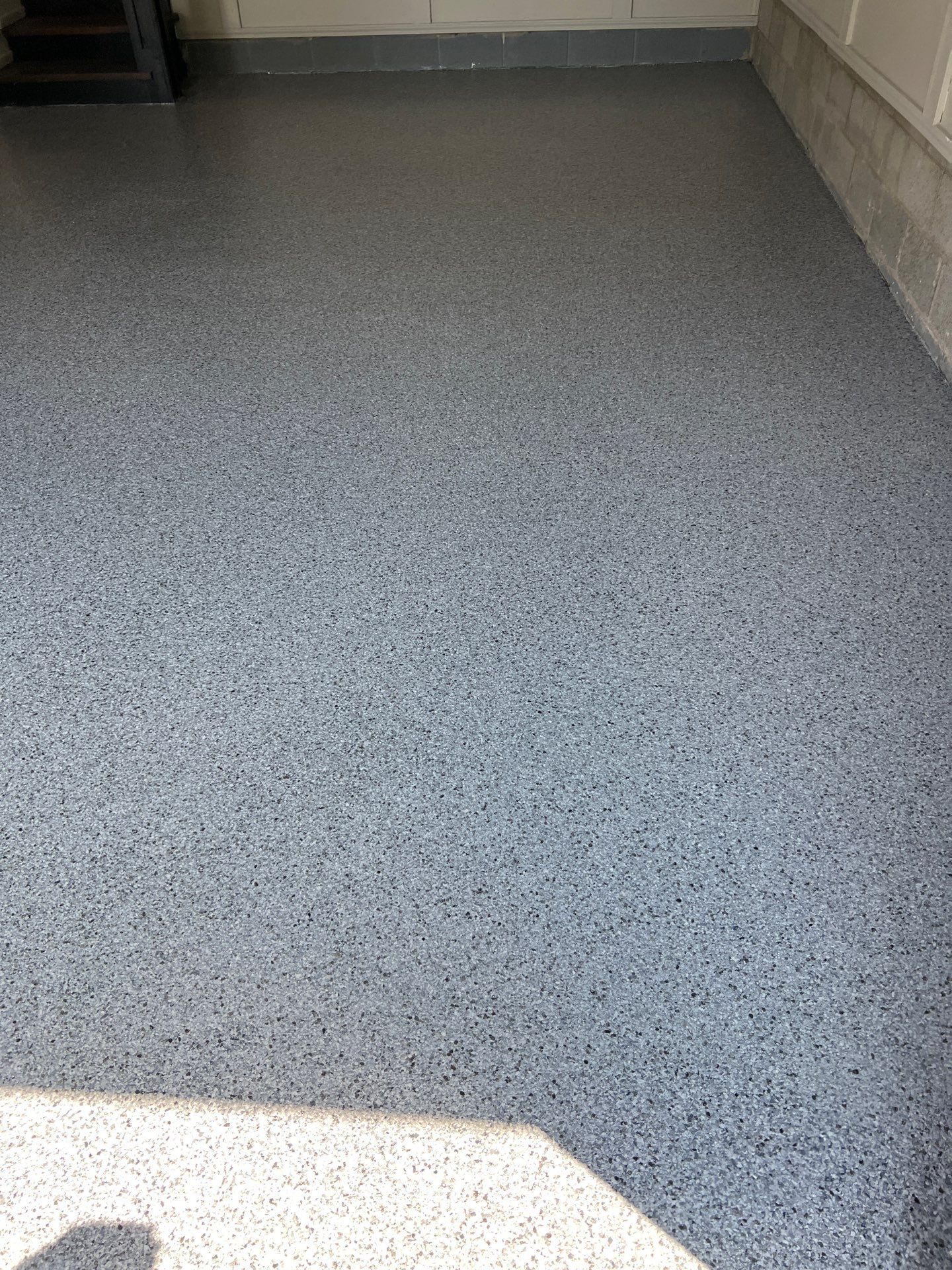 Silverado garage floor coating  by NG Masonry & Construction LLC