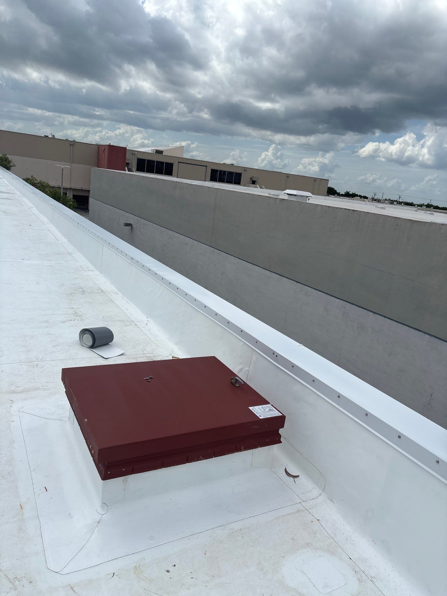 Commercial Flat Roof Replacement for Caribbean Catering in Doral by AJF ROOFING INC