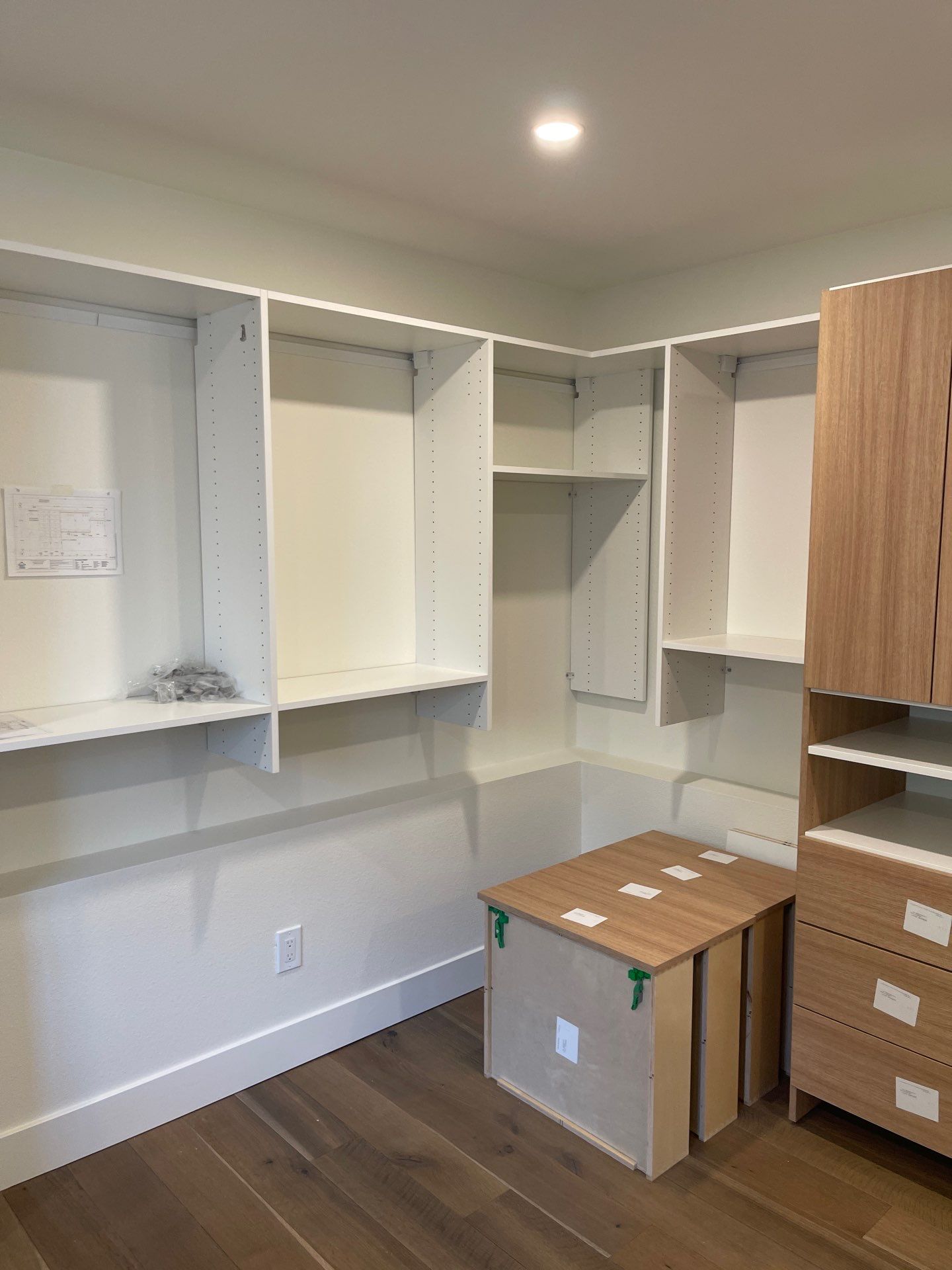 Two-Tone Walk-In Closet in Boulder by Concept 32, Inc.