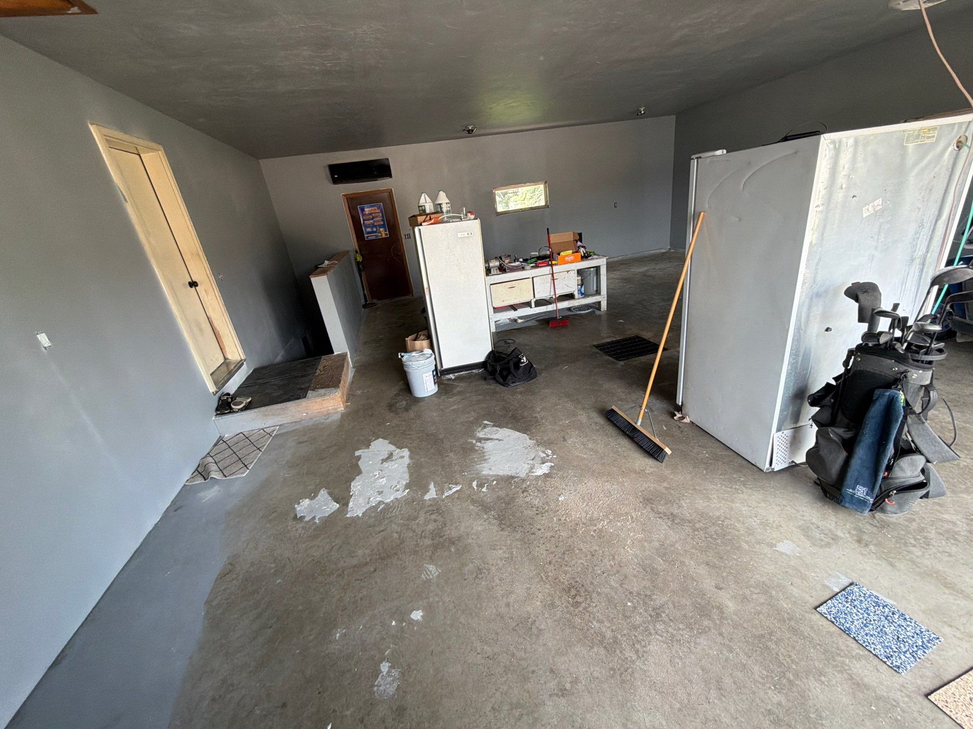 Garage Floor Concrete Coating and Surface Restoration in Colman by Select Painting, Coatings & Garage Cabinets