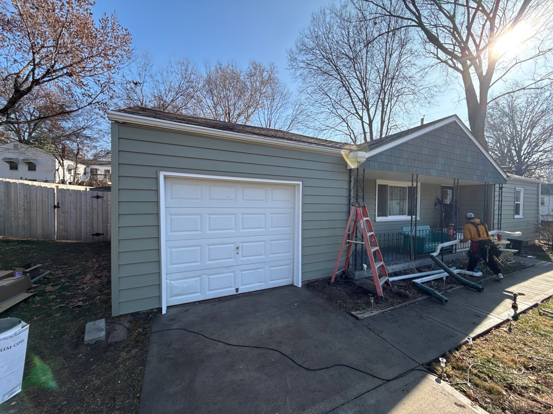 A whole new look for this Gladstone Home by EEC Windows, Siding & Roofing