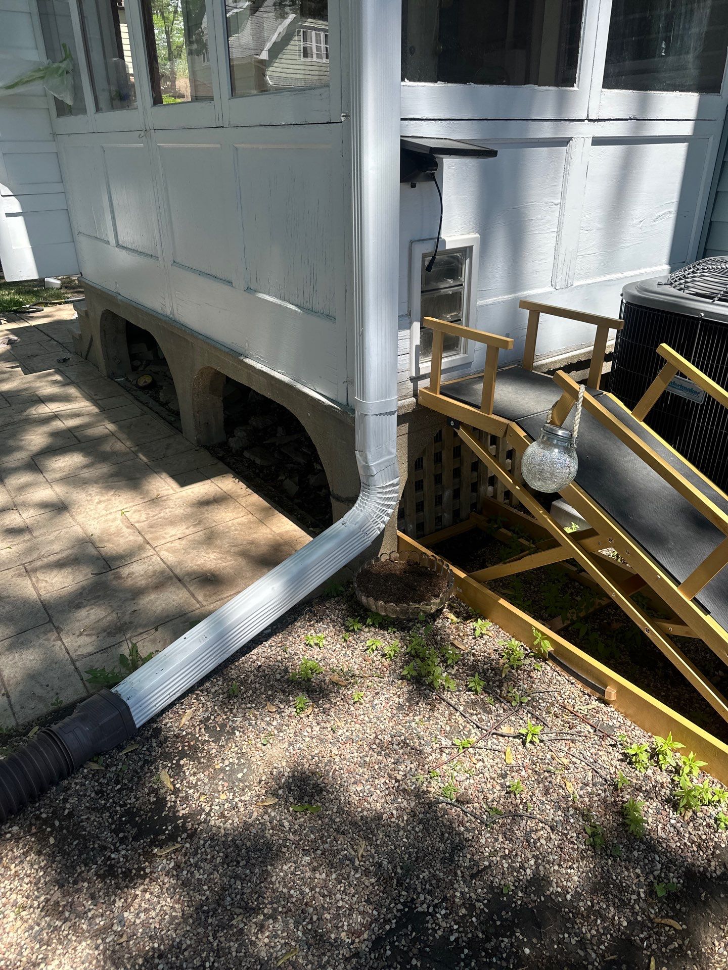 Exterior Porch Restoration and Privacy Fence Staining in Wauwatosa by OCS Contracting Services