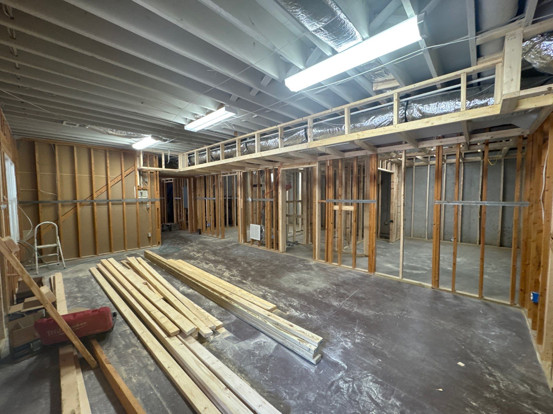 Full Basement Remodel in Powder Springs Featuring Custom Kitchenette by Swift Home Renovations