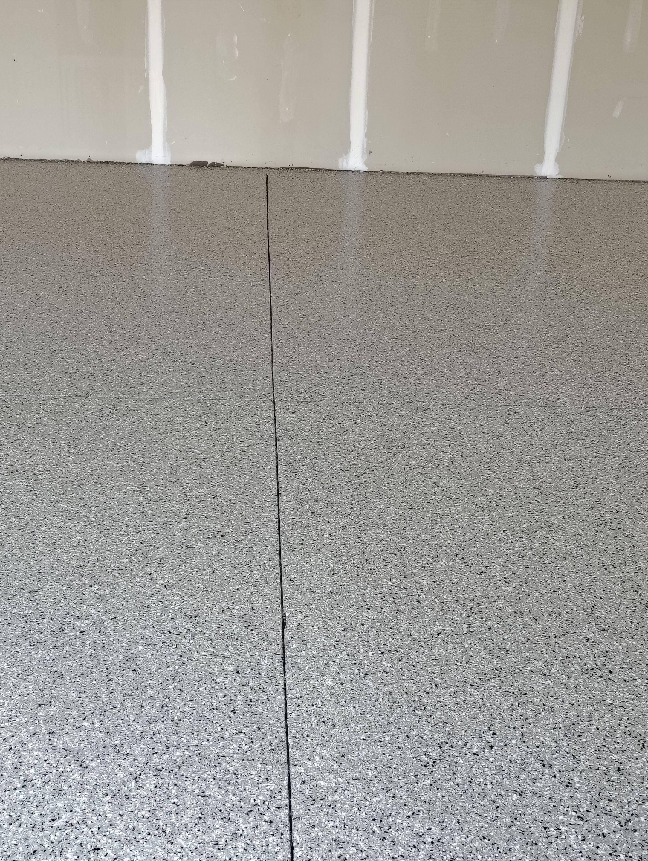 Epoxy Garage Floor Coating with Decorative Flake in Harrisburg by Select Painting, Coatings & Garage Cabinets