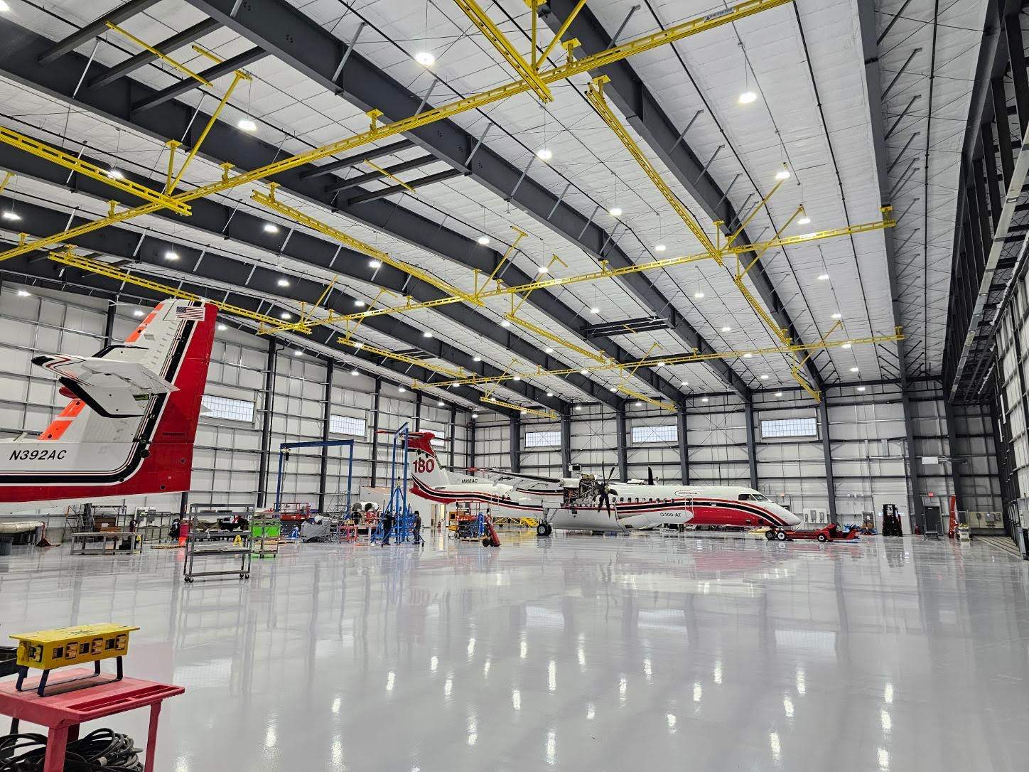 Airplane Hanger using Light Grey Commercial Penntek Epoxy by Croc Coatings, LLC