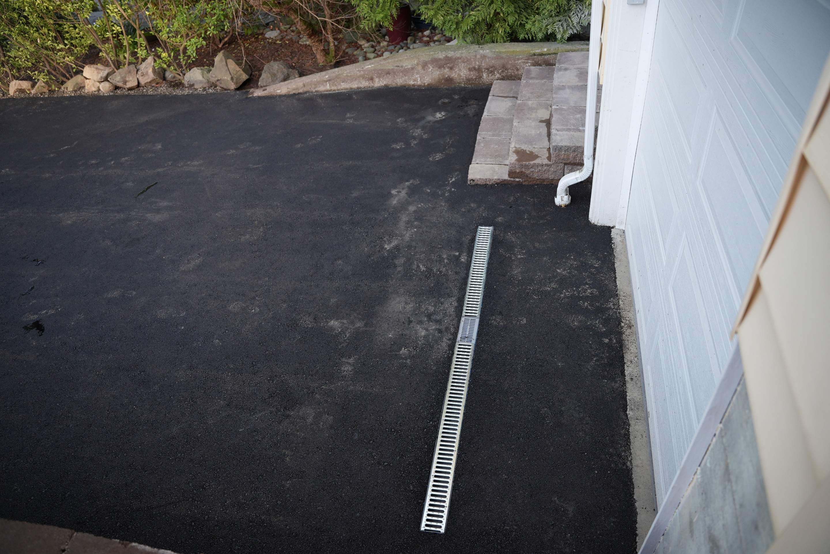 Lorra | Asphalt Driveway Repair & Retaining Wall by Jireh Asphalt & Concrete Inc 