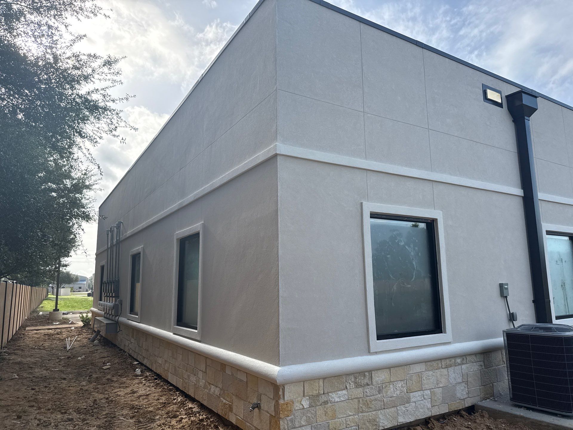 Commercial Façade Excellence with Bullnose Detailing by Apex Conventional Stucco Llc