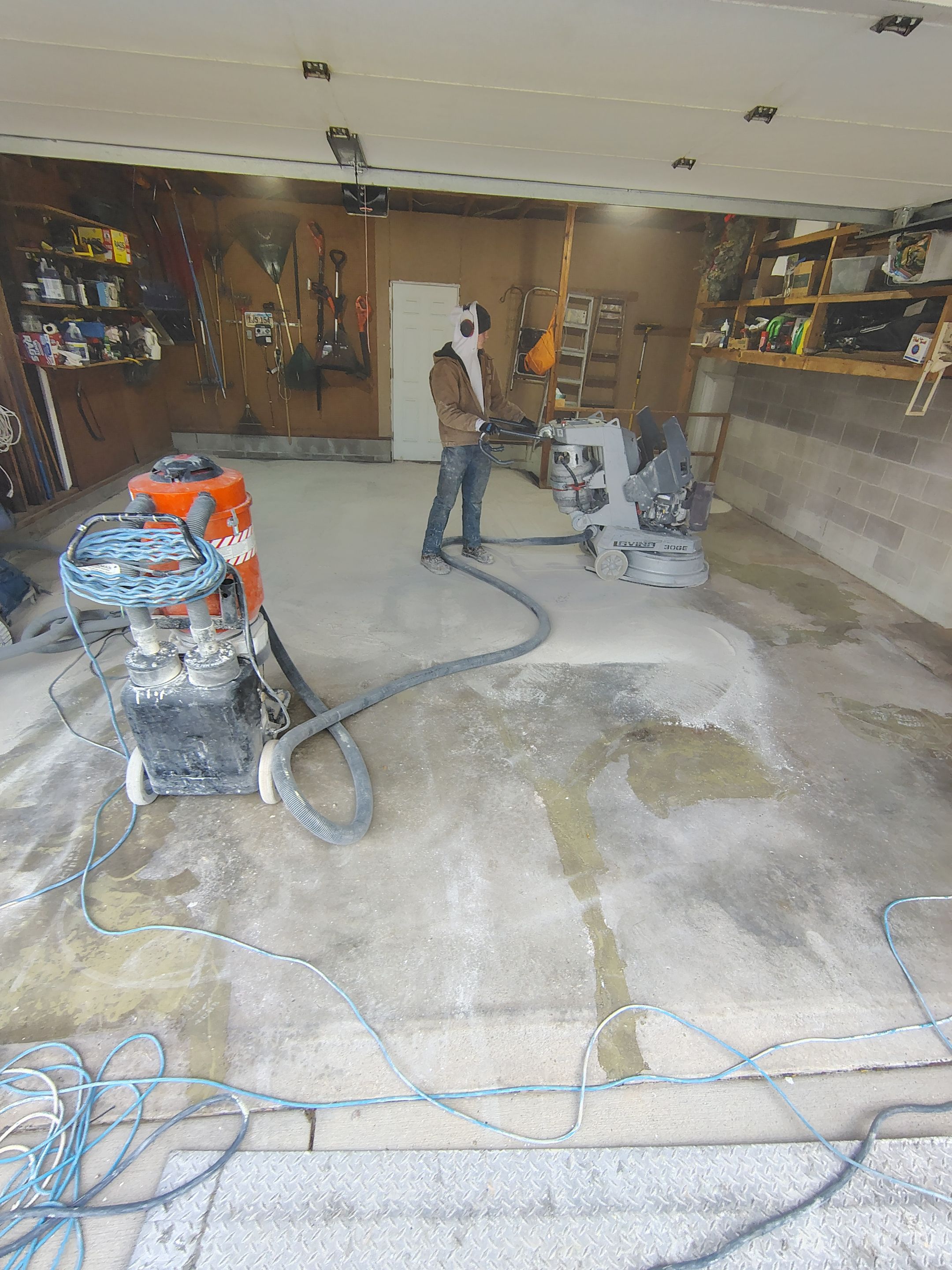 Sioux Falls Garage Epoxy Floor Installation and Concrete Crack Repair by Select Painting, Coatings & Garage Cabinets