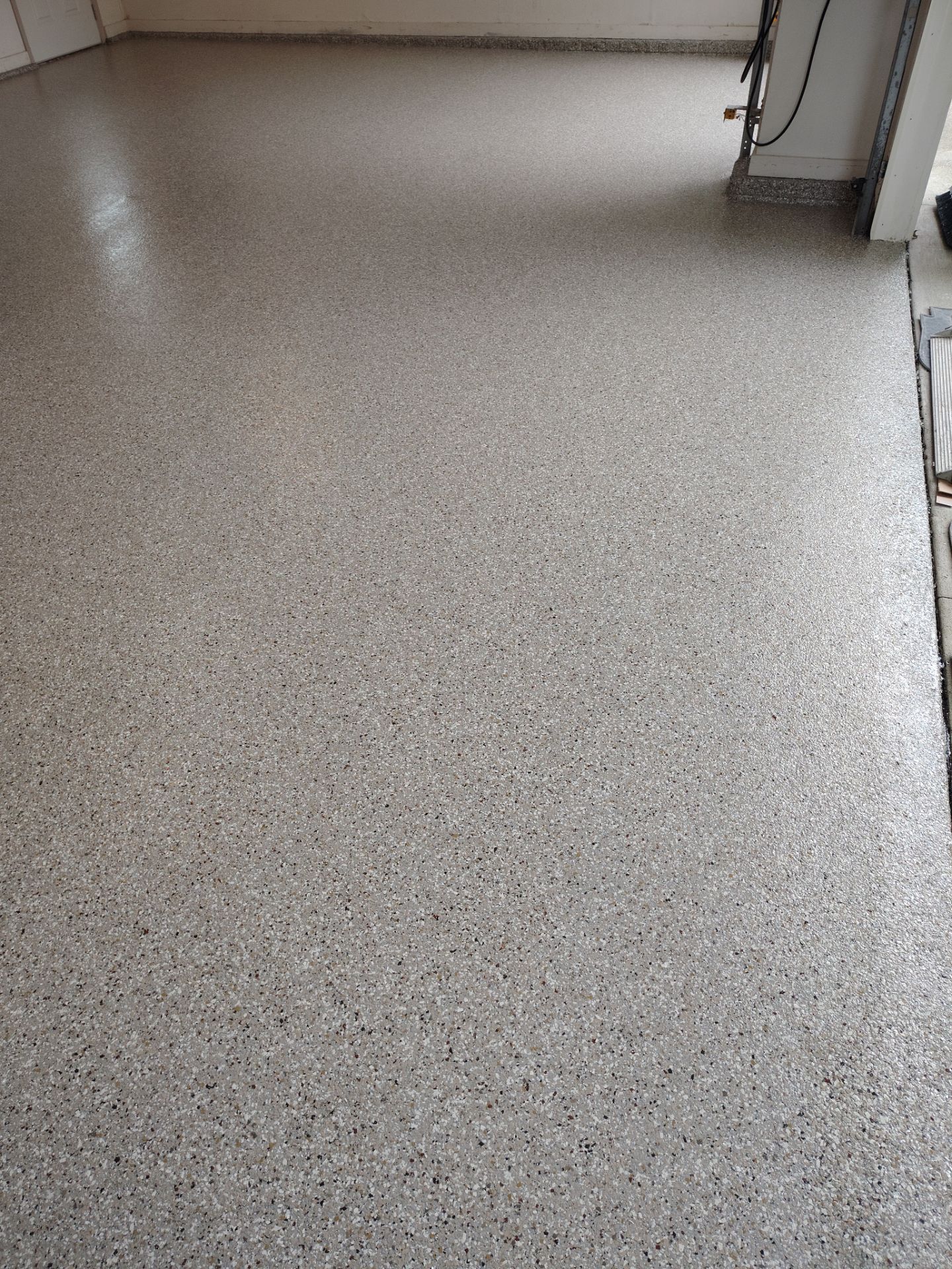 Residential Garage Floor Coating and Concrete Repair in Johnston by Revival Concrete Coatings