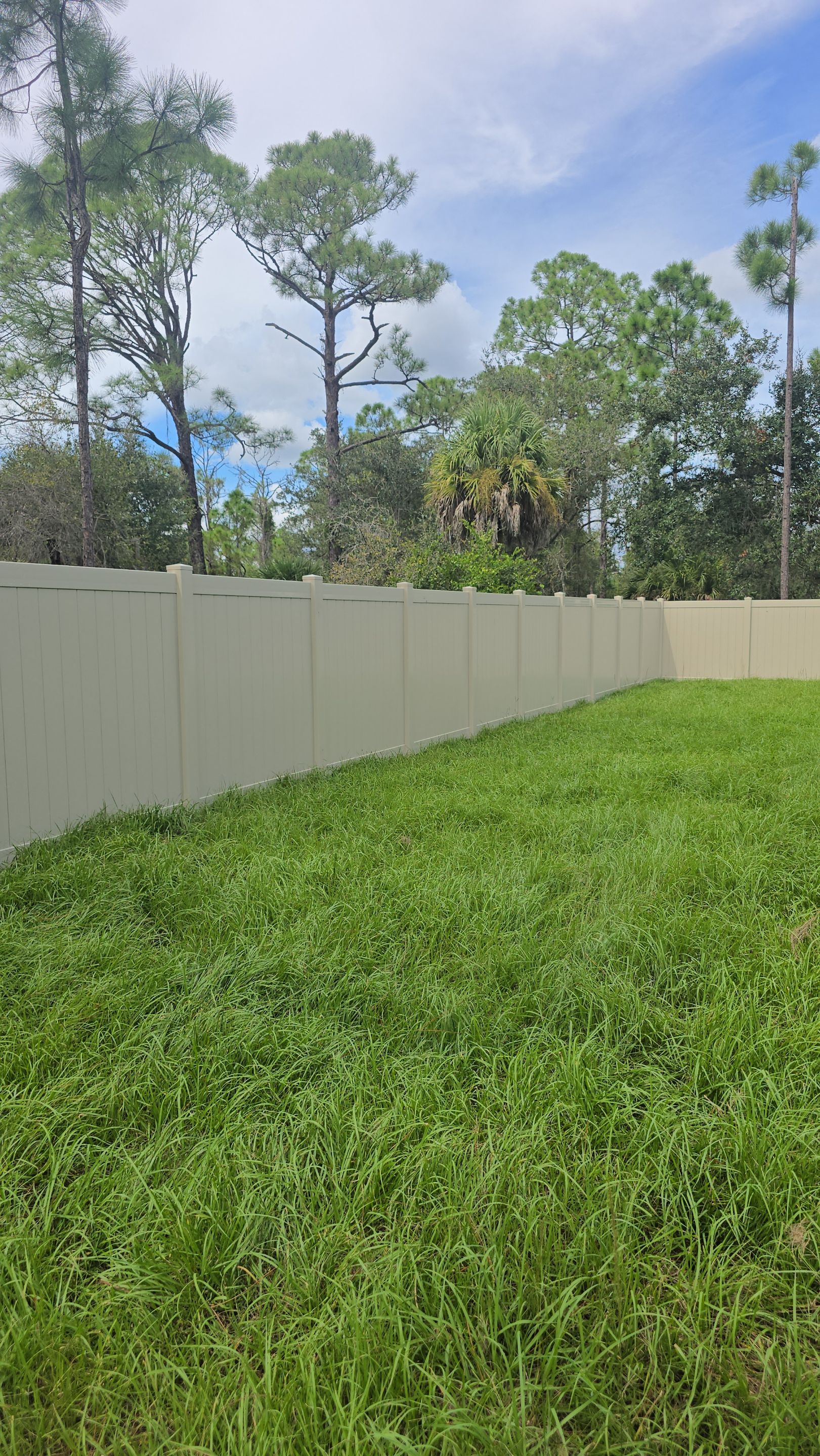 Tan Vinyl Privacy Fence and Gate Installation in Port Charlotte by True Fence LLC