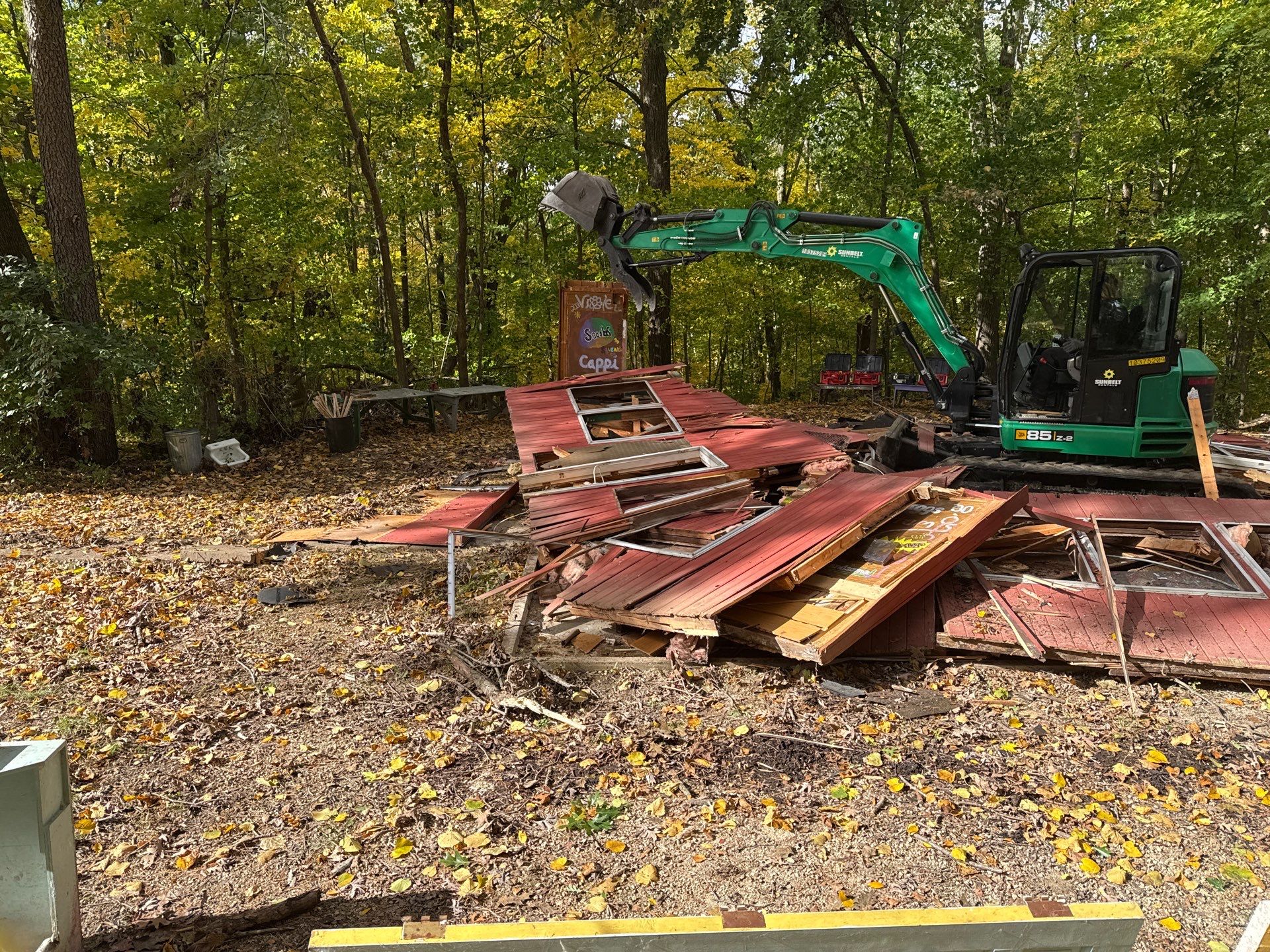 Cabin Demo by KRC Roofing And Siding
