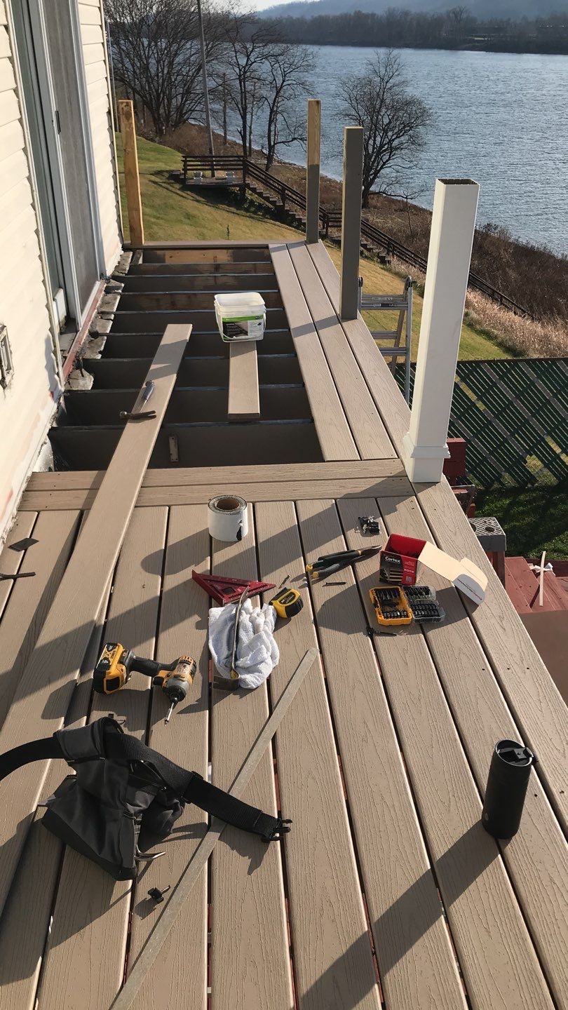 Deck Refurbush and Door Replacement using Trex Decking and Railing. Polaris Patio Doors by Secure Construction Company Inc