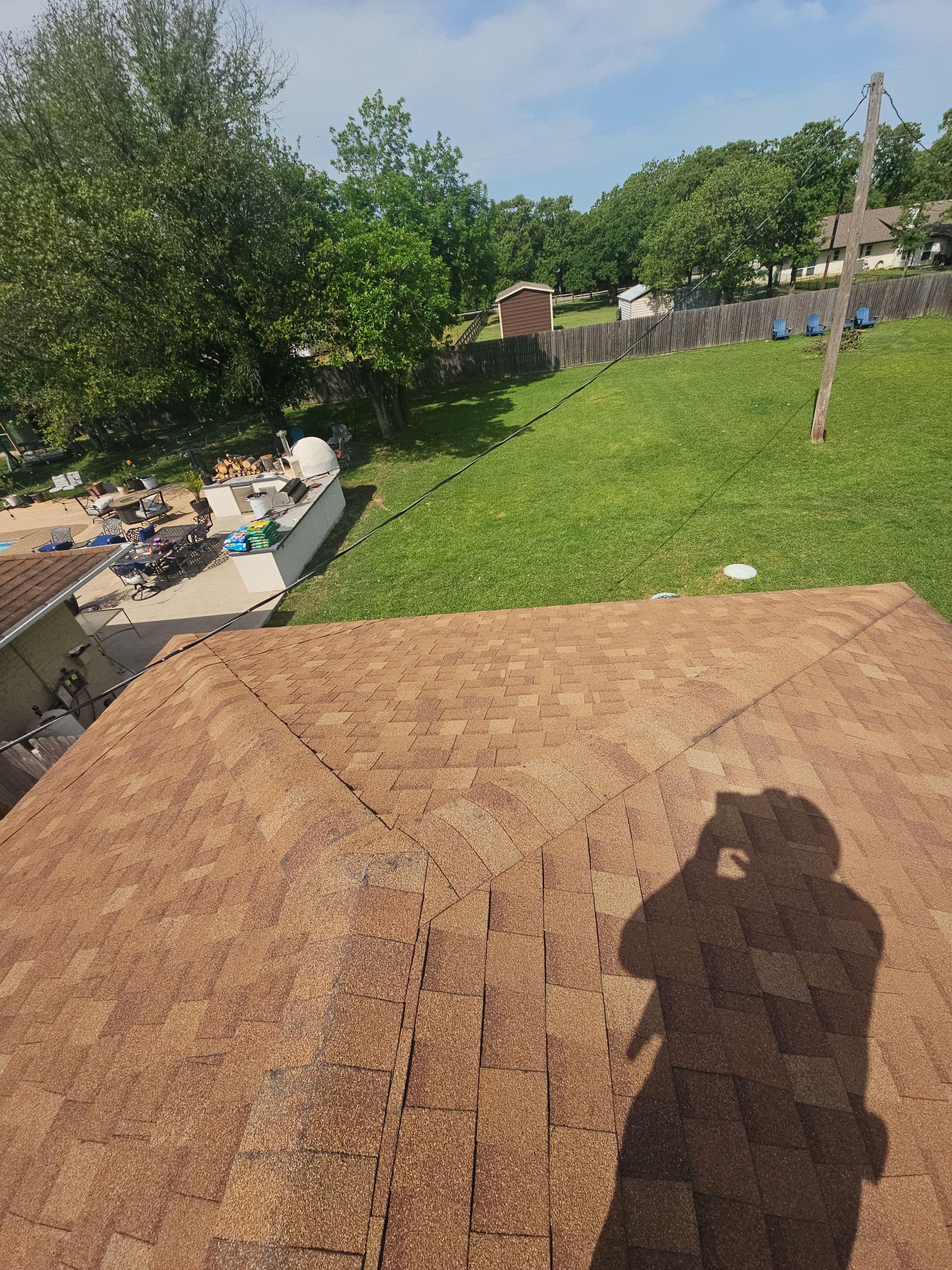 "Full Roof Replacement Due to Hail and Water Damage – Before & After" by road roofing llc